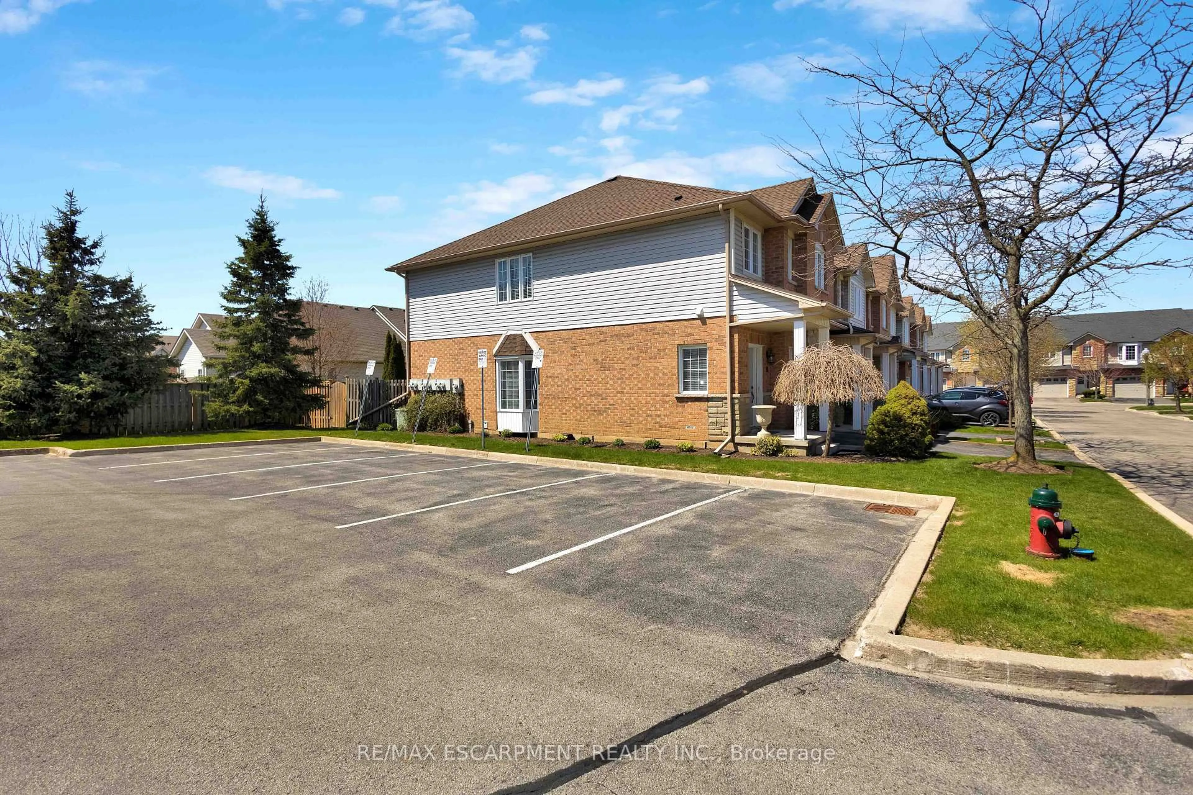A pic from outside/outdoor area/front of a property/back of a property/a pic from drone, street for 232 Stonehenge Dr #8, Hamilton Ontario L9K 1R5