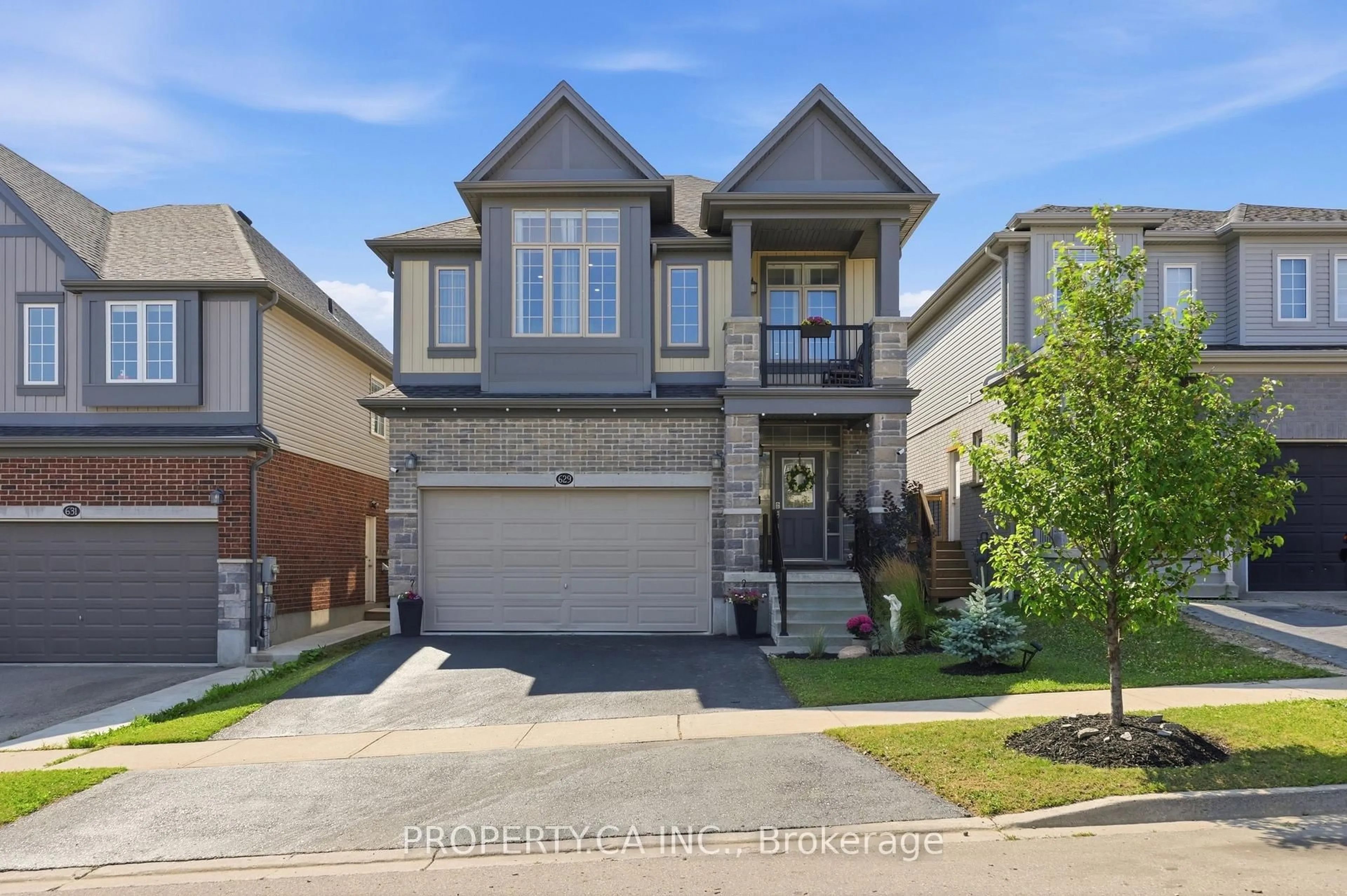 Home with brick exterior material, street for 629 Wild Rye St, Waterloo Ontario N2V 0E3