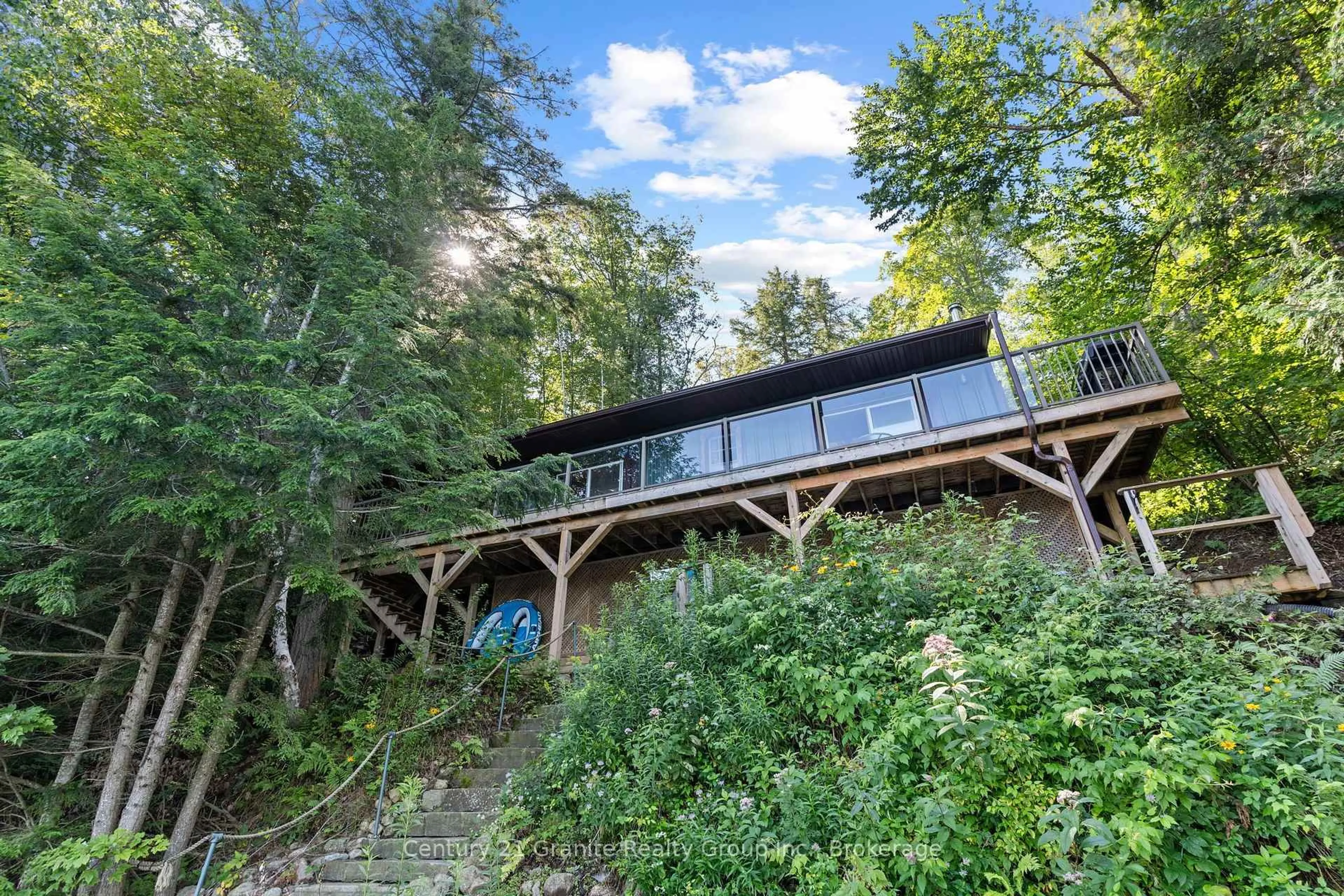 A pic from outside/outdoor area/front of a property/back of a property/a pic from drone, forest/trees view for 1411 Tock Lane, Algonquin Highlands Ontario P0A 1E0