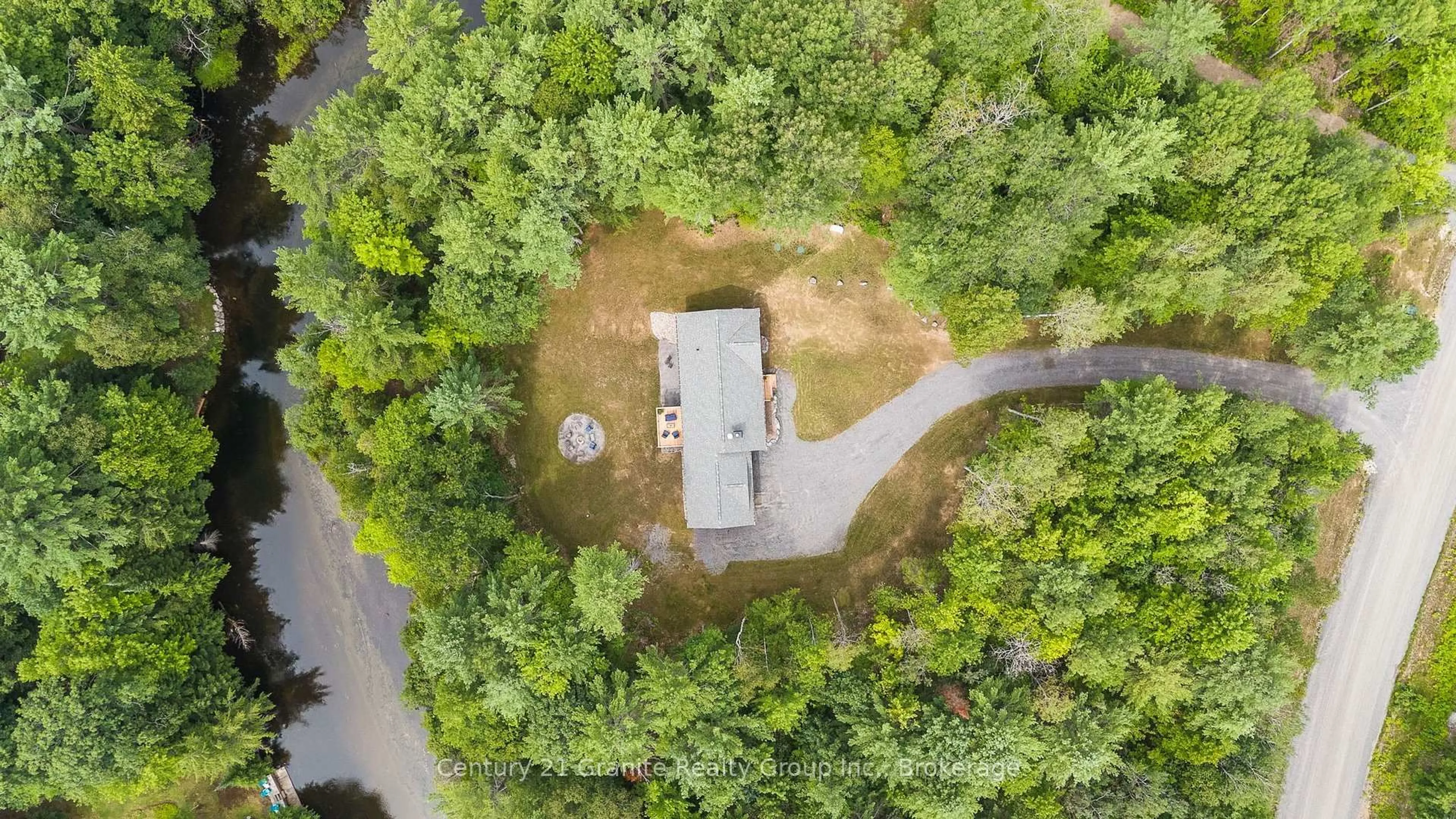 A pic from outside/outdoor area/front of a property/back of a property/a pic from drone, forest/trees view for 1097 Hawk Valley Rd, Algonquin Highlands Ontario K0M 1S0