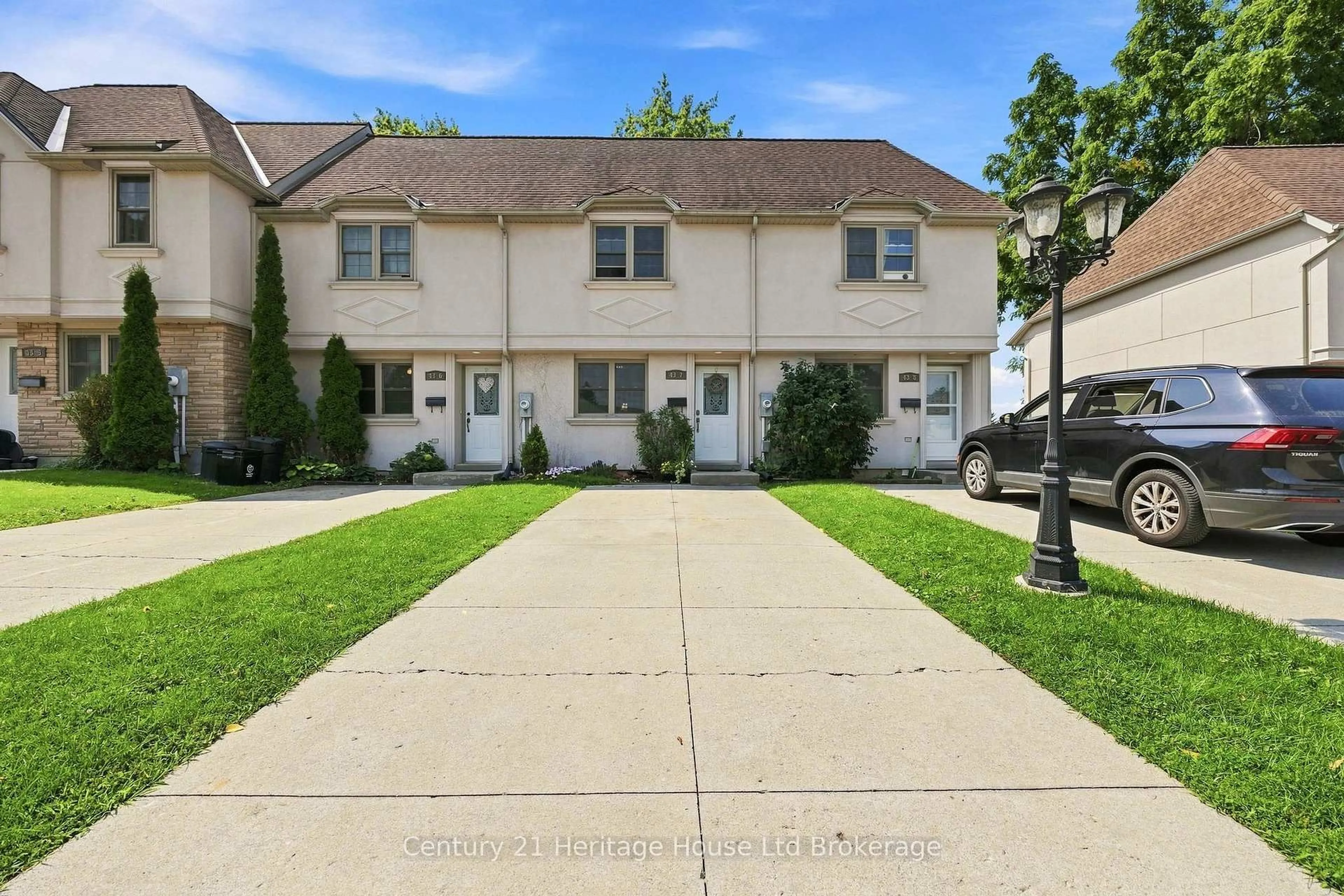 A pic from outside/outdoor area/front of a property/back of a property/a pic from drone, street for 43 Blandford St #7, Woodstock Ontario N4S 7H7
