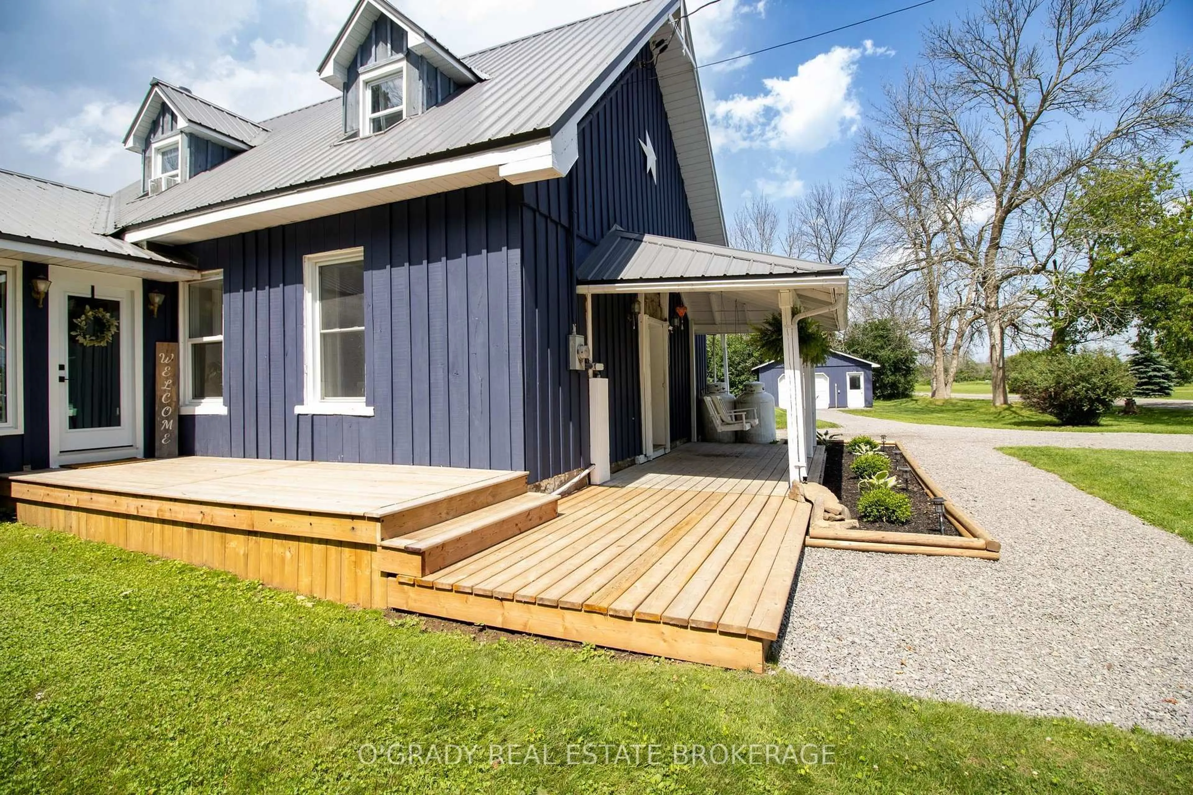 Home with vinyl exterior material, street for 6582 6th Concession Rd, Elizabethtown-Kitley Ontario K0E 1A0