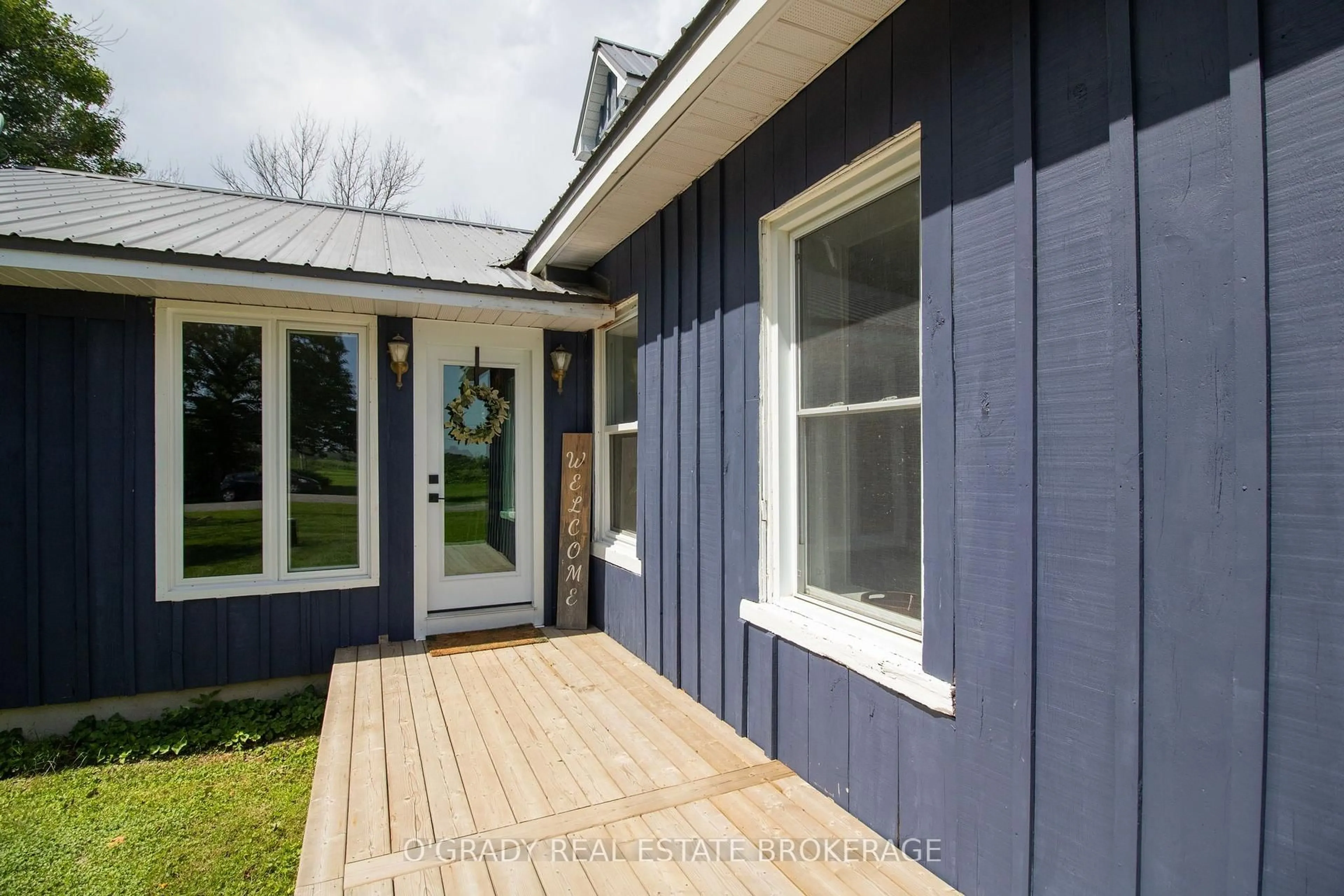 Home with vinyl exterior material, street for 6582 6th Concession Rd, Elizabethtown-Kitley Ontario K0E 1A0