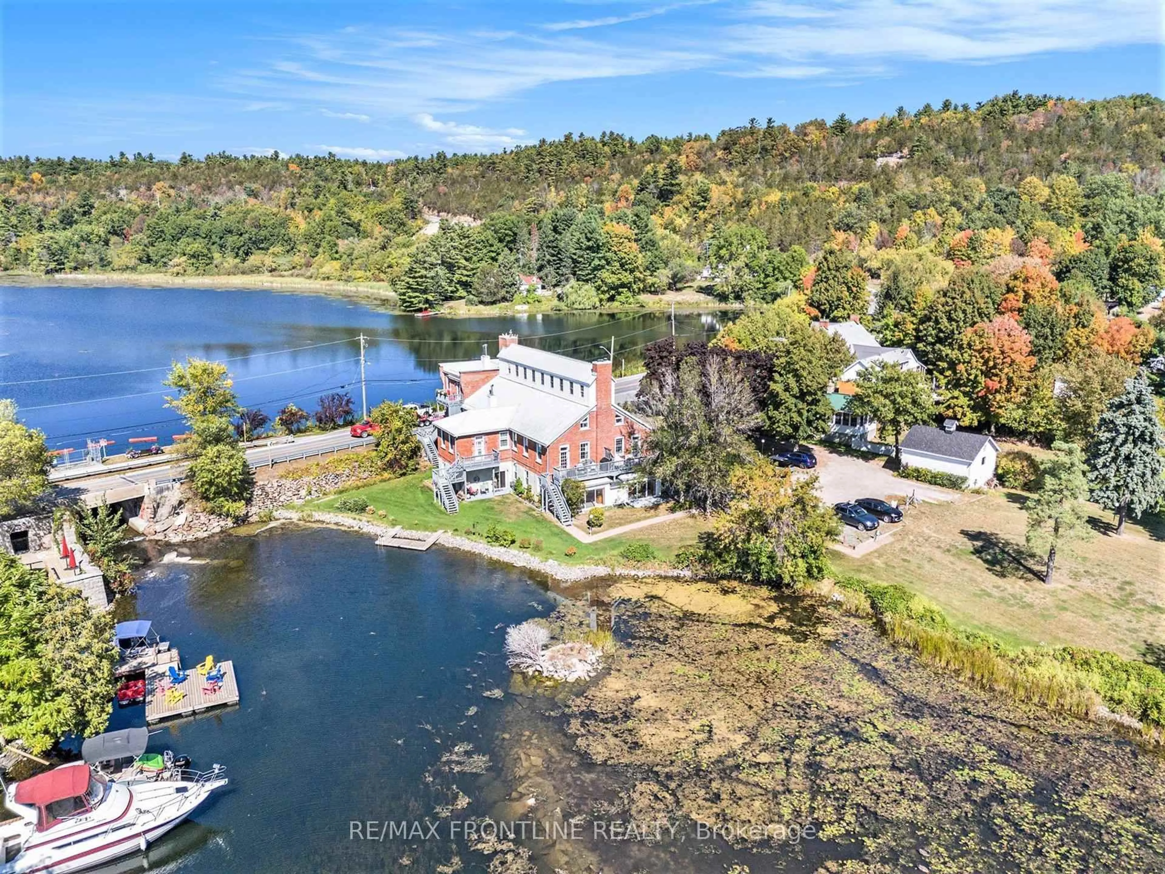 A pic from outside/outdoor area/front of a property/back of a property/a pic from drone, water/lake/river/ocean view for 19 Main St #1, Westport Ontario K0G 1X0