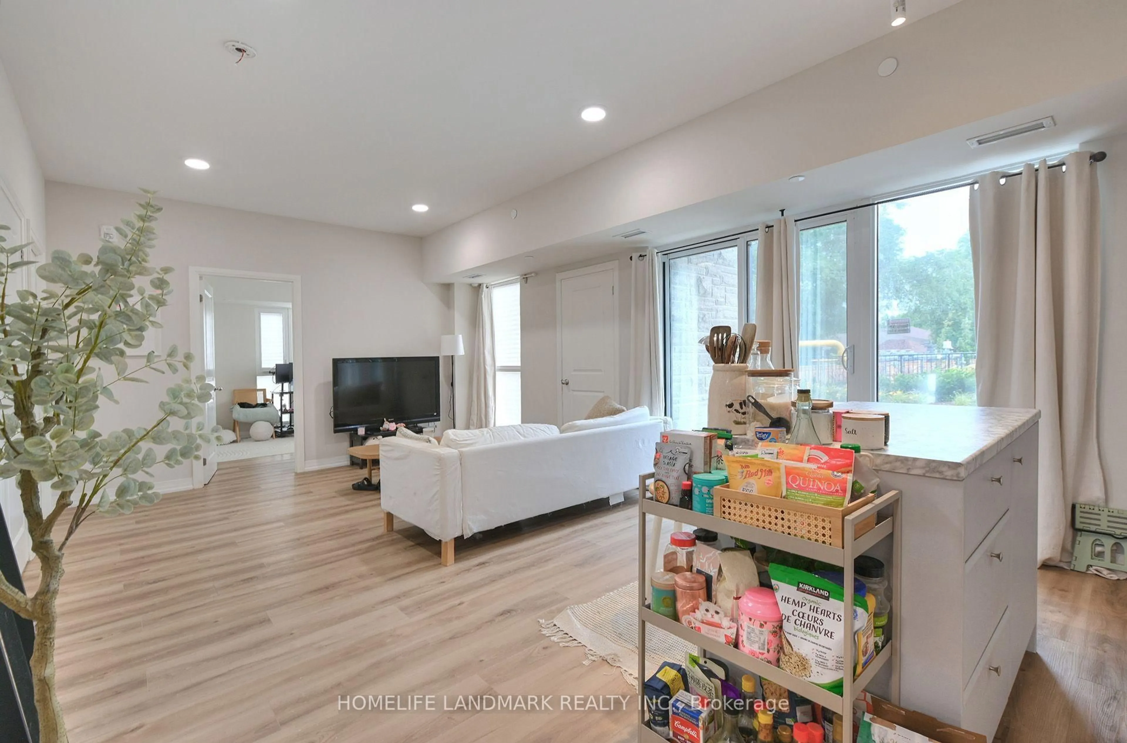 Living room with furniture, unknown for 50 Herrick Ave ##115, St. Catharines Ontario L2P 2T9