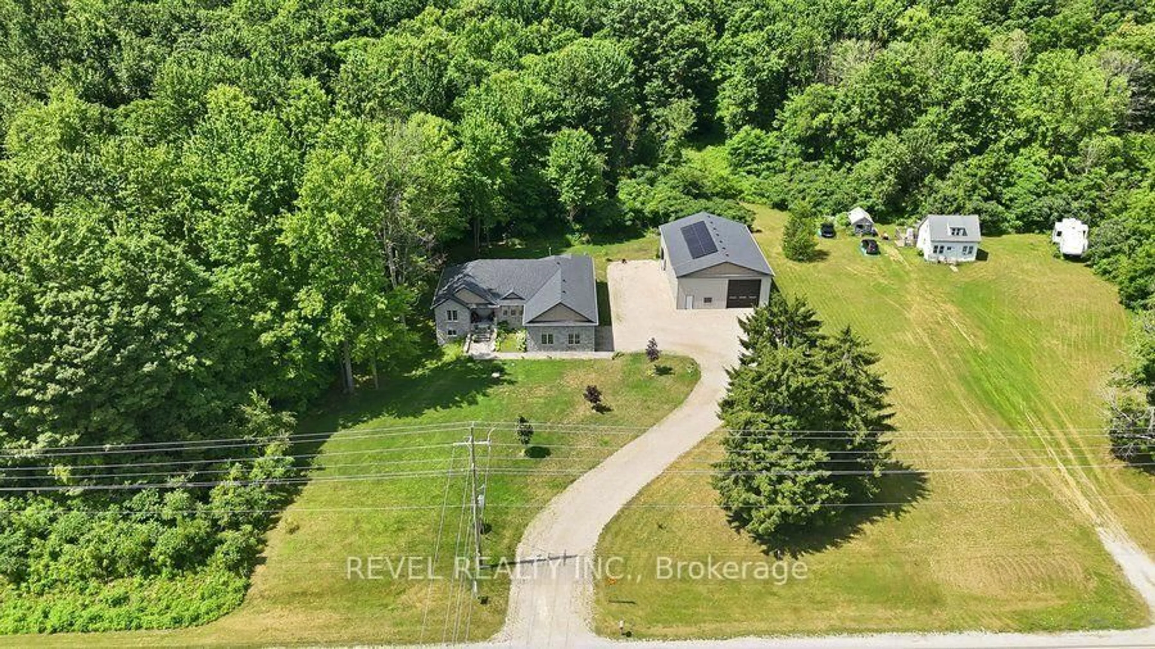 A pic from outside/outdoor area/front of a property/back of a property/a pic from drone, unknown for 1299 County Road 23, Norfolk Ontario N0E 1G0