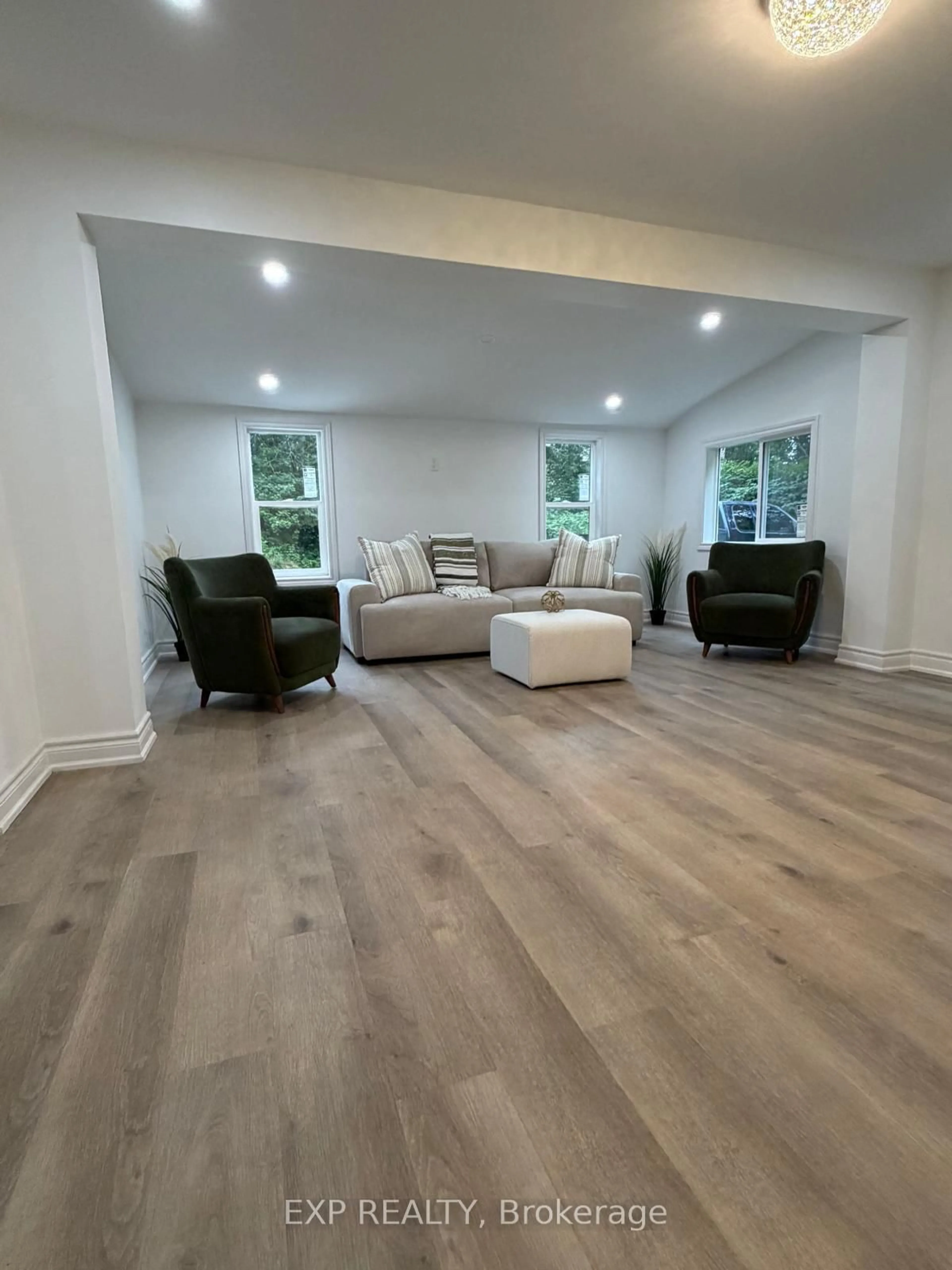 Living room with furniture, wood/laminate floor for 137 Old North Rd, Huntsville Ontario P1H 2J4
