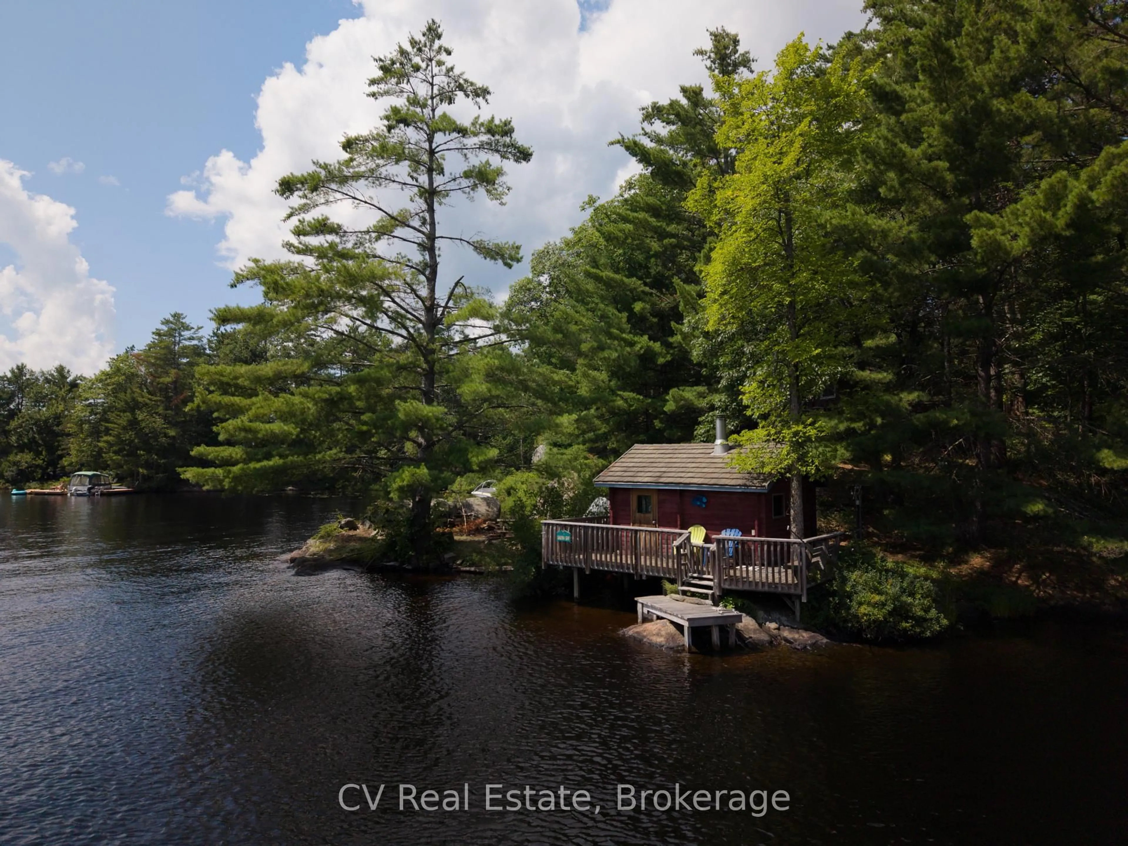A pic from outside/outdoor area/front of a property/back of a property/a pic from drone, water/lake/river/ocean view for 1037 Sunrise Dr, Gravenhurst Ontario P1P 1R3