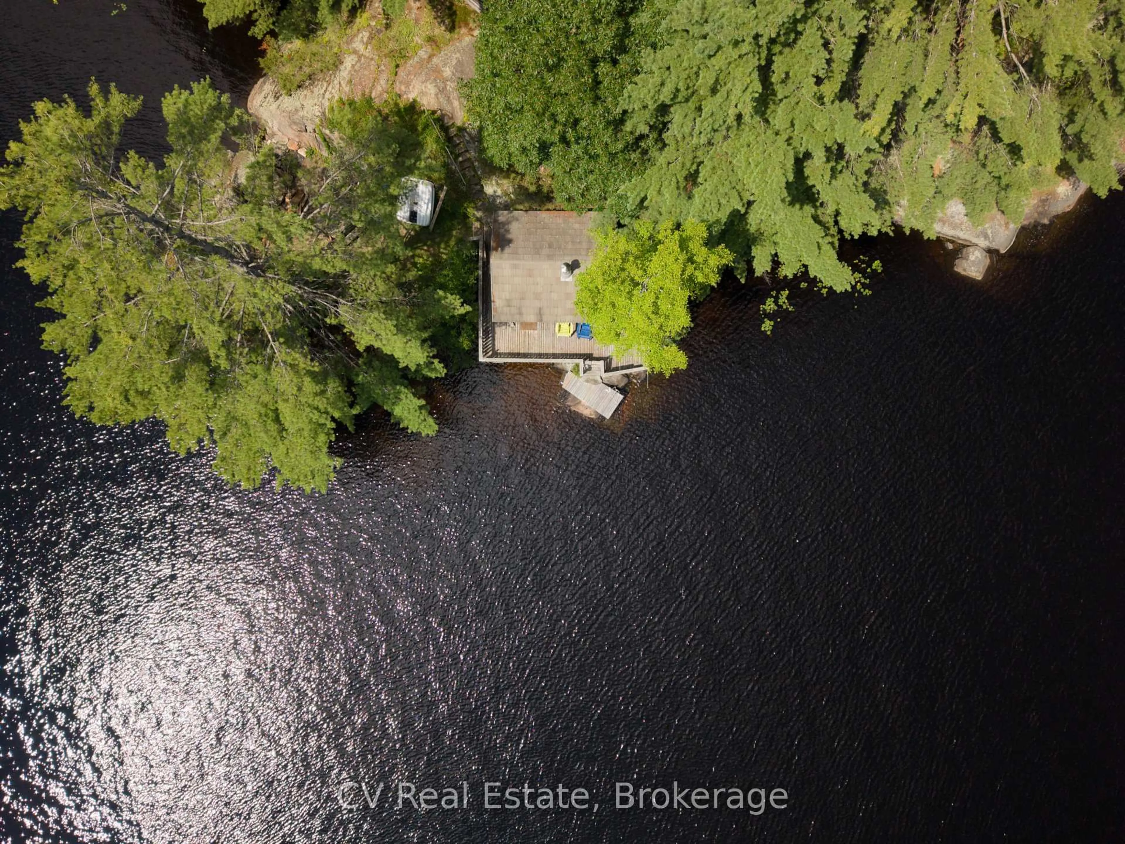 A pic from outside/outdoor area/front of a property/back of a property/a pic from drone, water/lake/river/ocean view for 1037 Sunrise Dr, Gravenhurst Ontario P1P 1R3