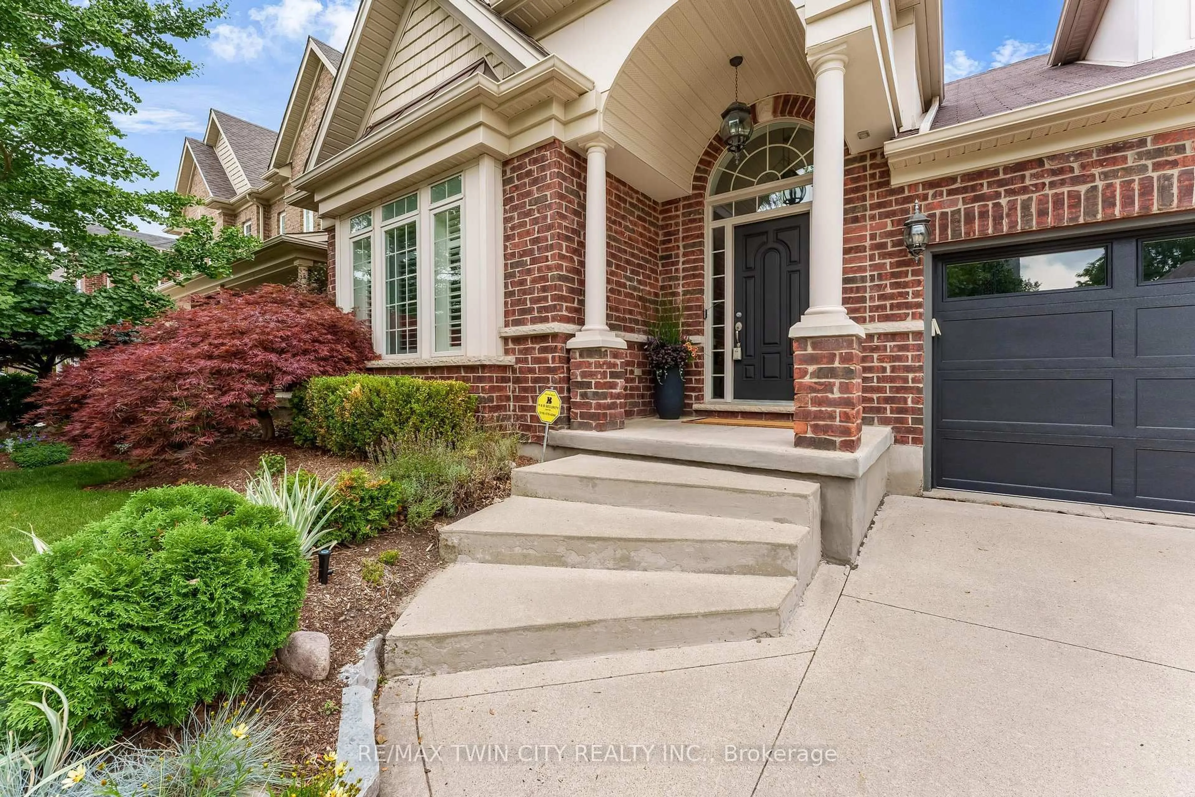 Home with brick exterior material, street for 213 Edgewater Cres, Kitchener Ontario N2A 4M2