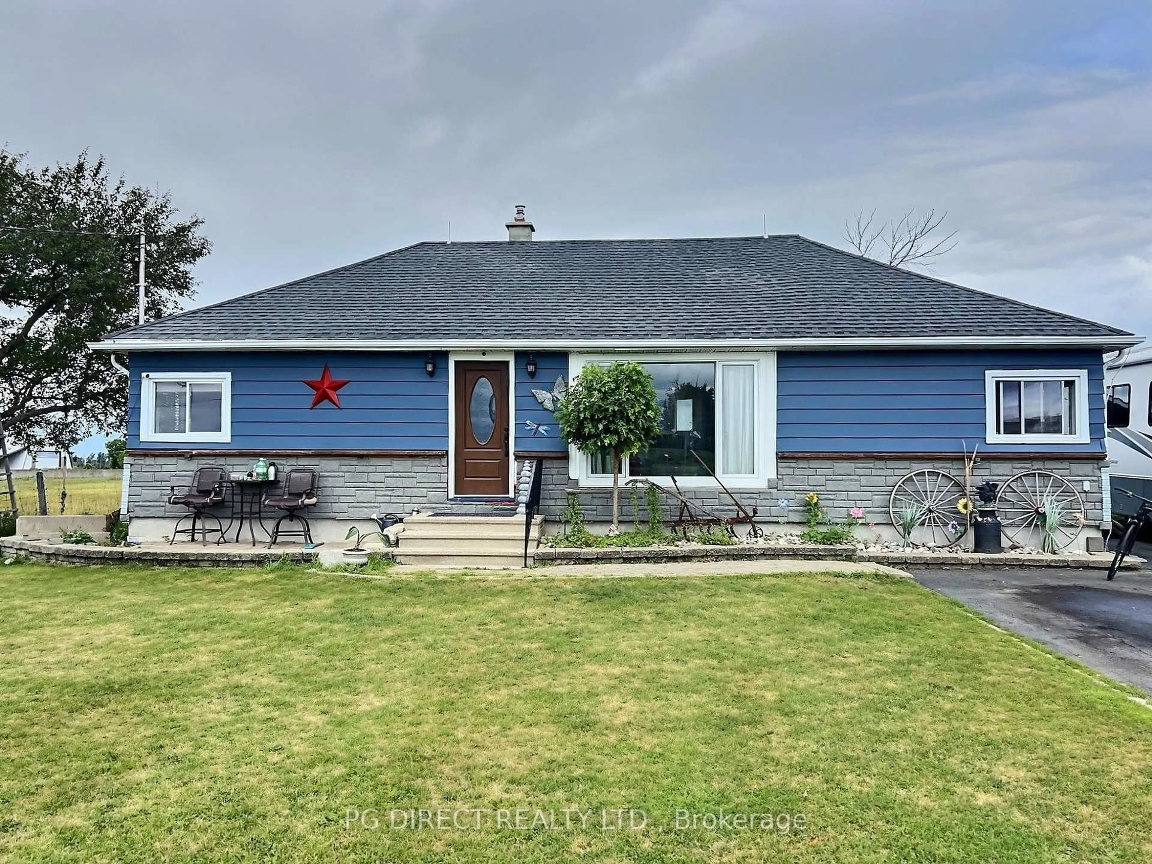 A pic from outside/outdoor area/front of a property/back of a property/a pic from drone, unknown for 13391 County Rd 9, North Dundas Ontario K0C 1H0