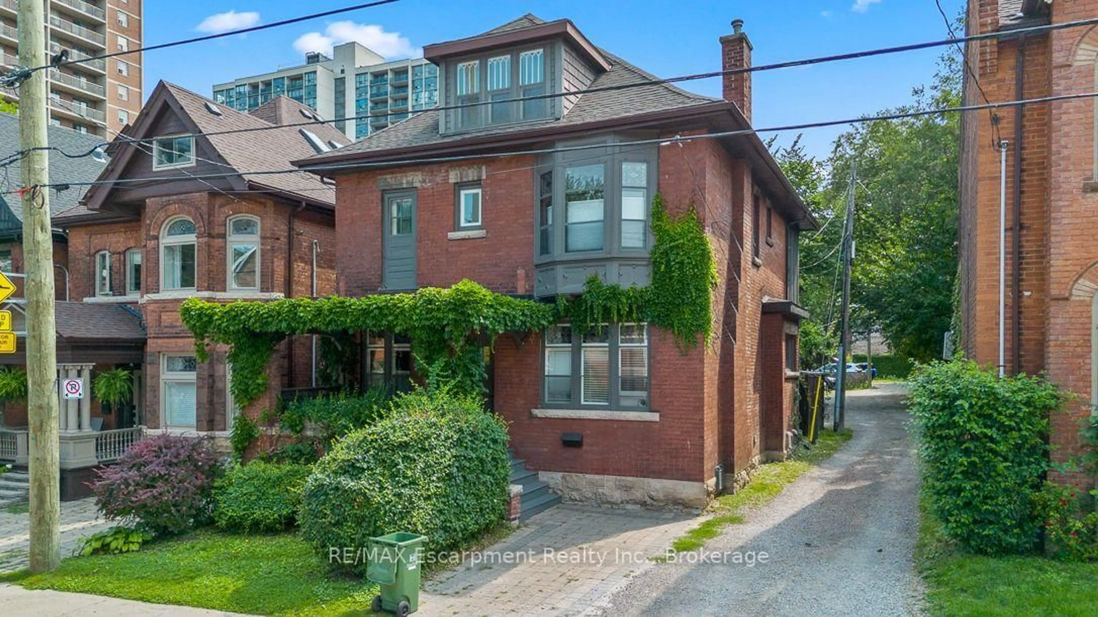 Home with brick exterior material, street for 217 Caroline St, Hamilton Ontario L8P 3L5