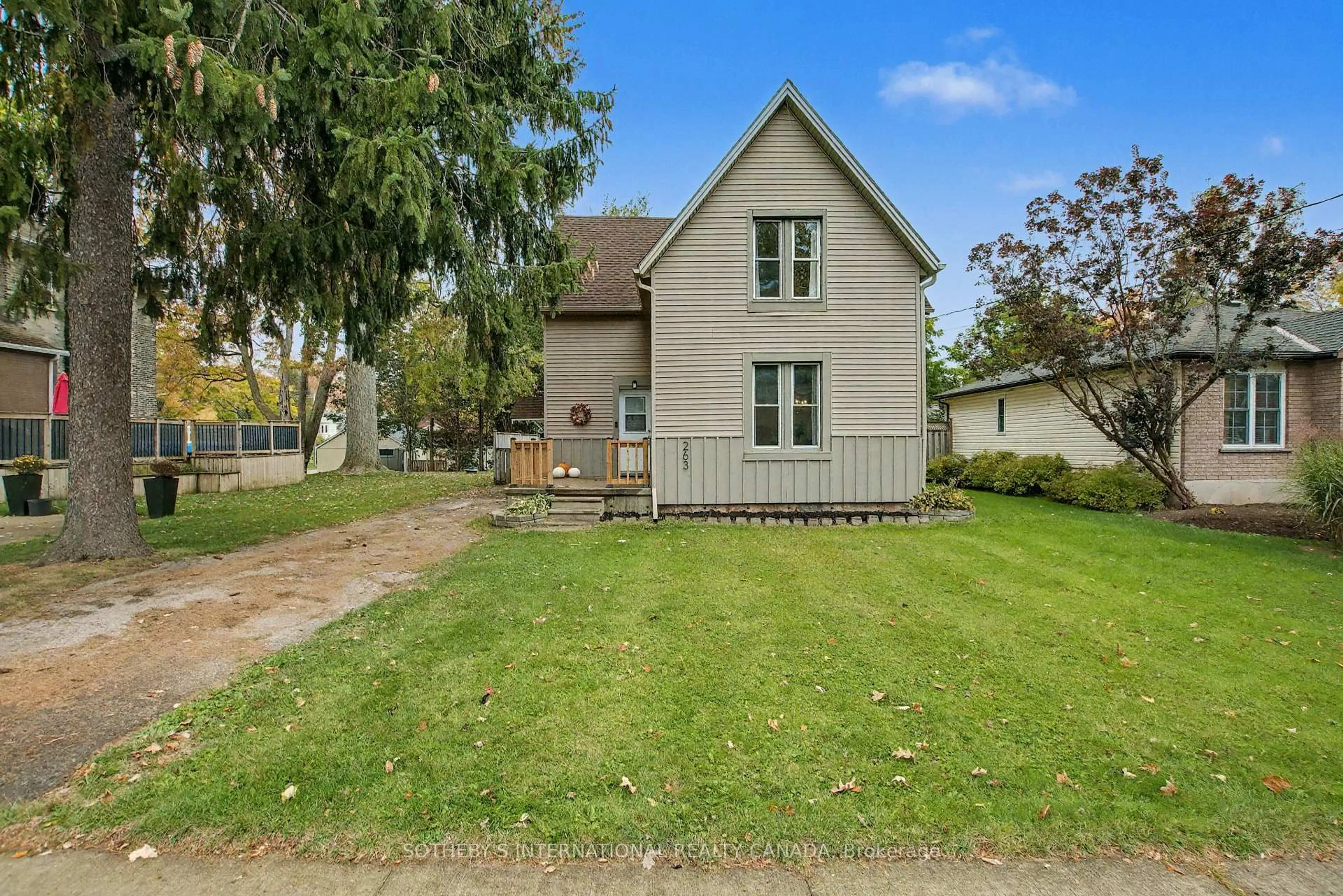 A pic from outside/outdoor area/front of a property/back of a property/a pic from drone, street for 263 Cumberland St, Minto Ontario N0G 2P0