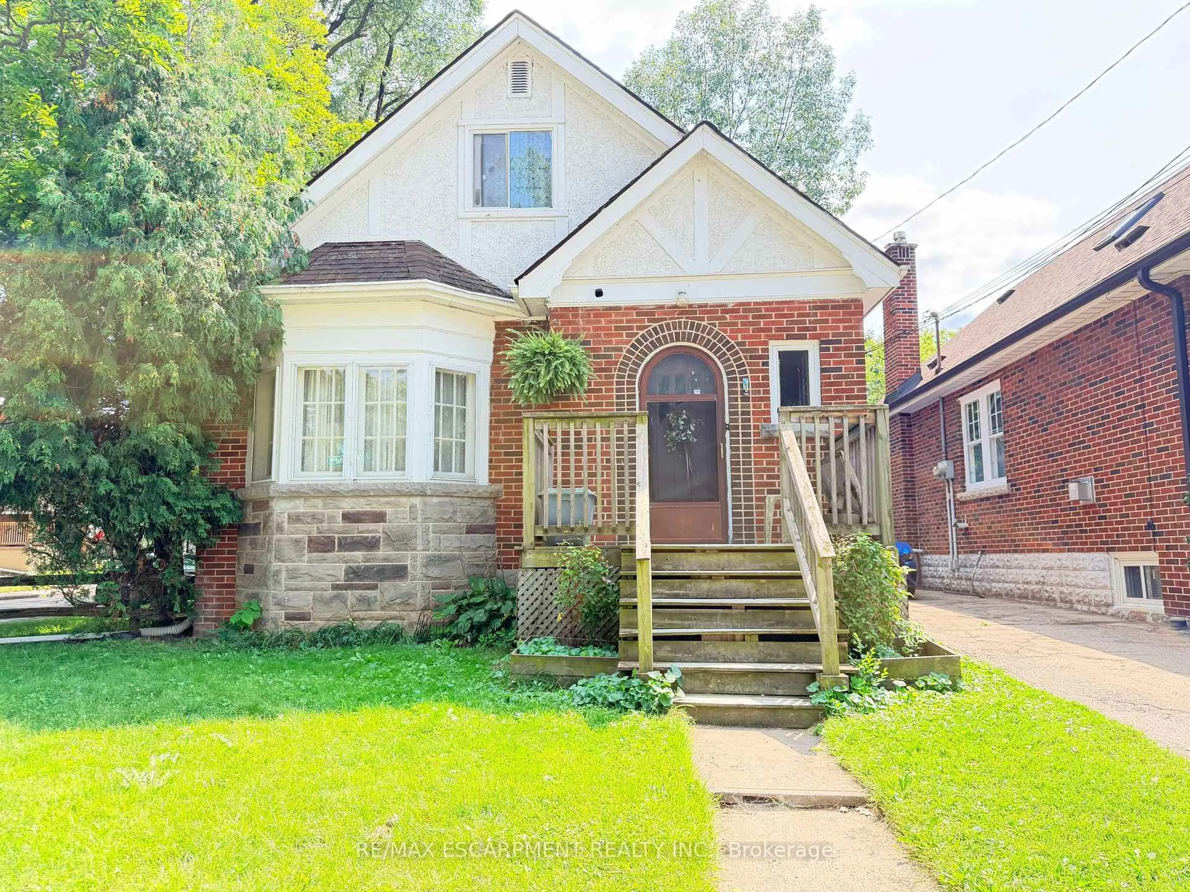 Home with brick exterior material, street for 1 Norwood Rd, Hamilton Ontario L8S 3P8