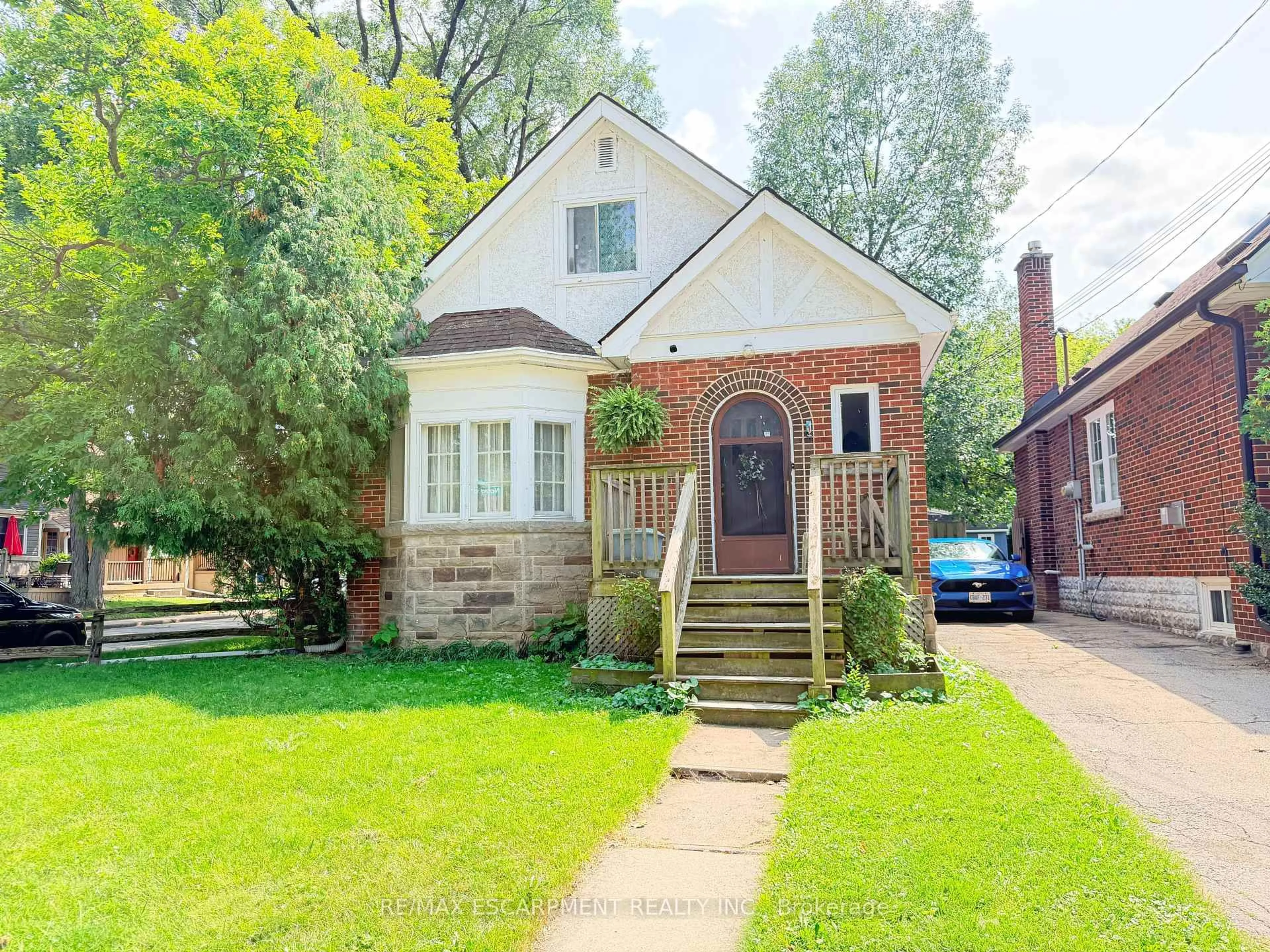 Home with brick exterior material, street for 1 Norwood Rd, Hamilton Ontario L8S 3P8