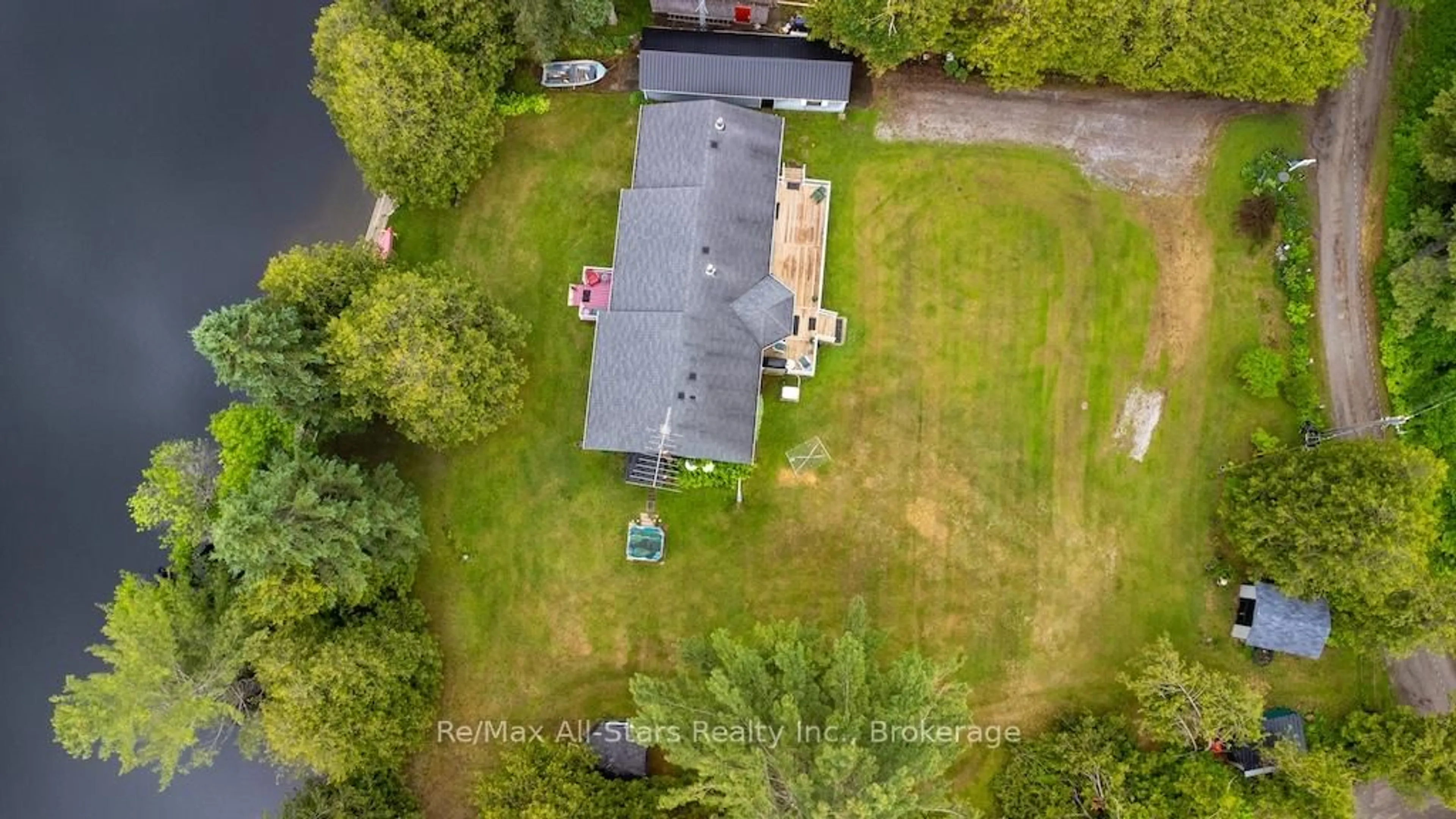 A pic from outside/outdoor area/front of a property/back of a property/a pic from drone, unknown for 27 Aspen Dr, Kawartha Lakes Ontario K0M 1N0