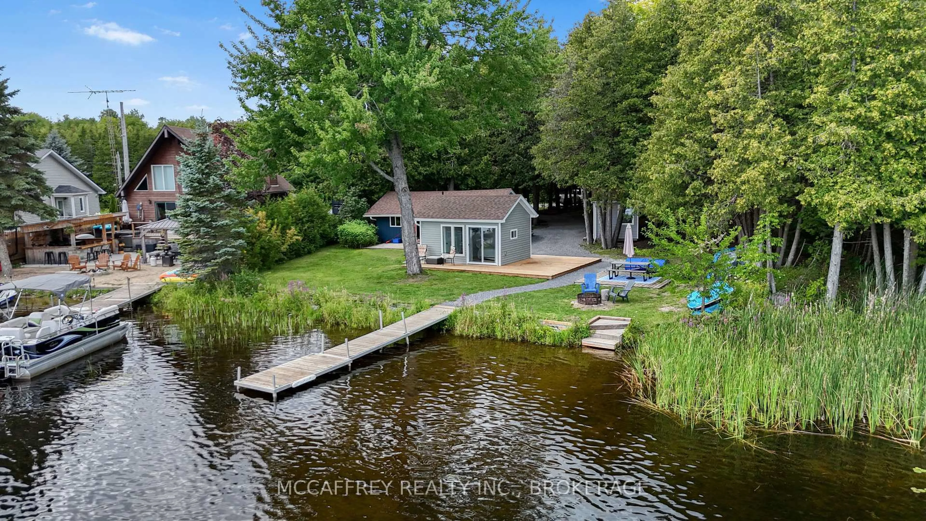 A pic from outside/outdoor area/front of a property/back of a property/a pic from drone, water/lake/river/ocean view for 154 A/B North Beaver Lake Rd, Stone Mills Ontario K0K 2A0