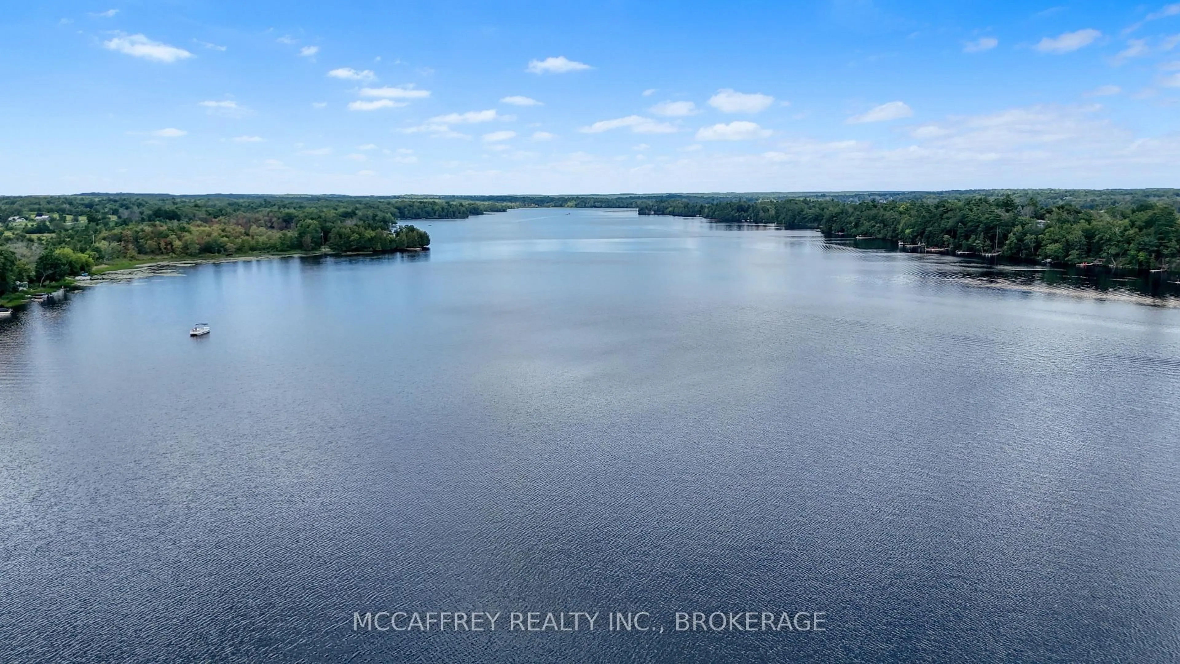 A pic from outside/outdoor area/front of a property/back of a property/a pic from drone, water/lake/river/ocean view for 154 A/B North Beaver Lake Rd, Stone Mills Ontario K0K 2A0