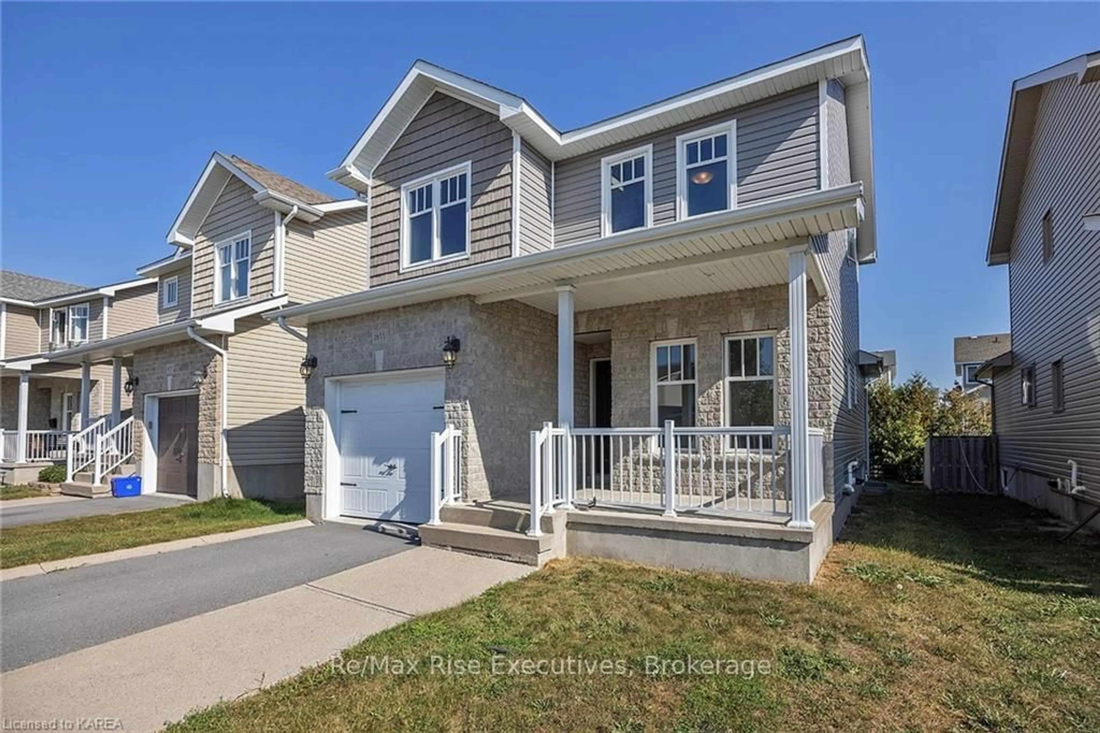 Home with vinyl exterior material, street for 1653 Crimson Cres, Kingston Ontario K7P 0J3