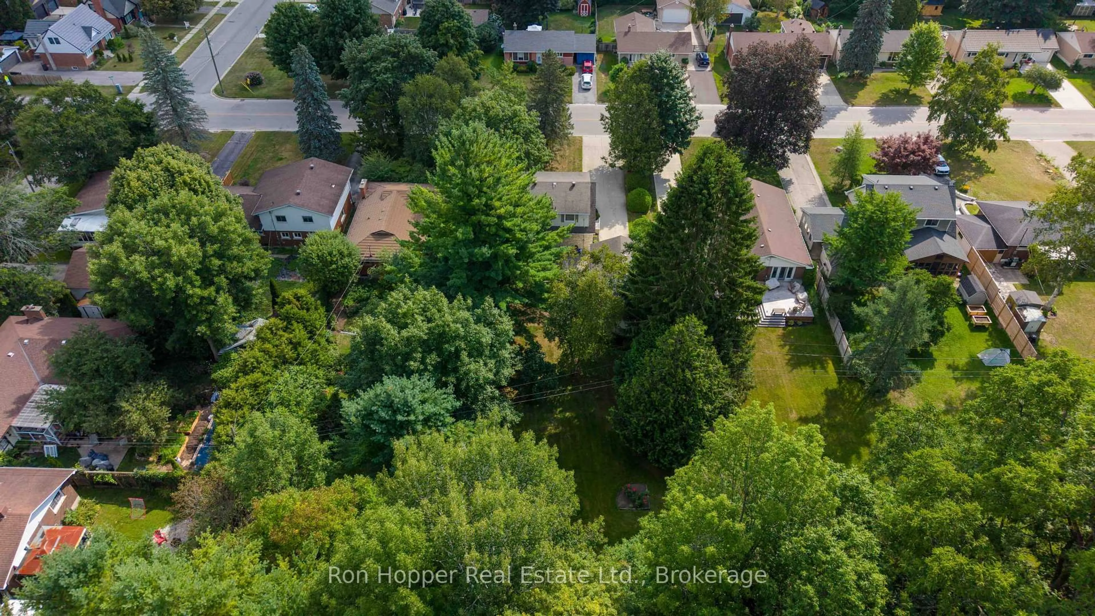 A pic from outside/outdoor area/front of a property/back of a property/a pic from drone, forest/trees view for 680 6th Ave, Owen Sound Ontario N4K 5E7