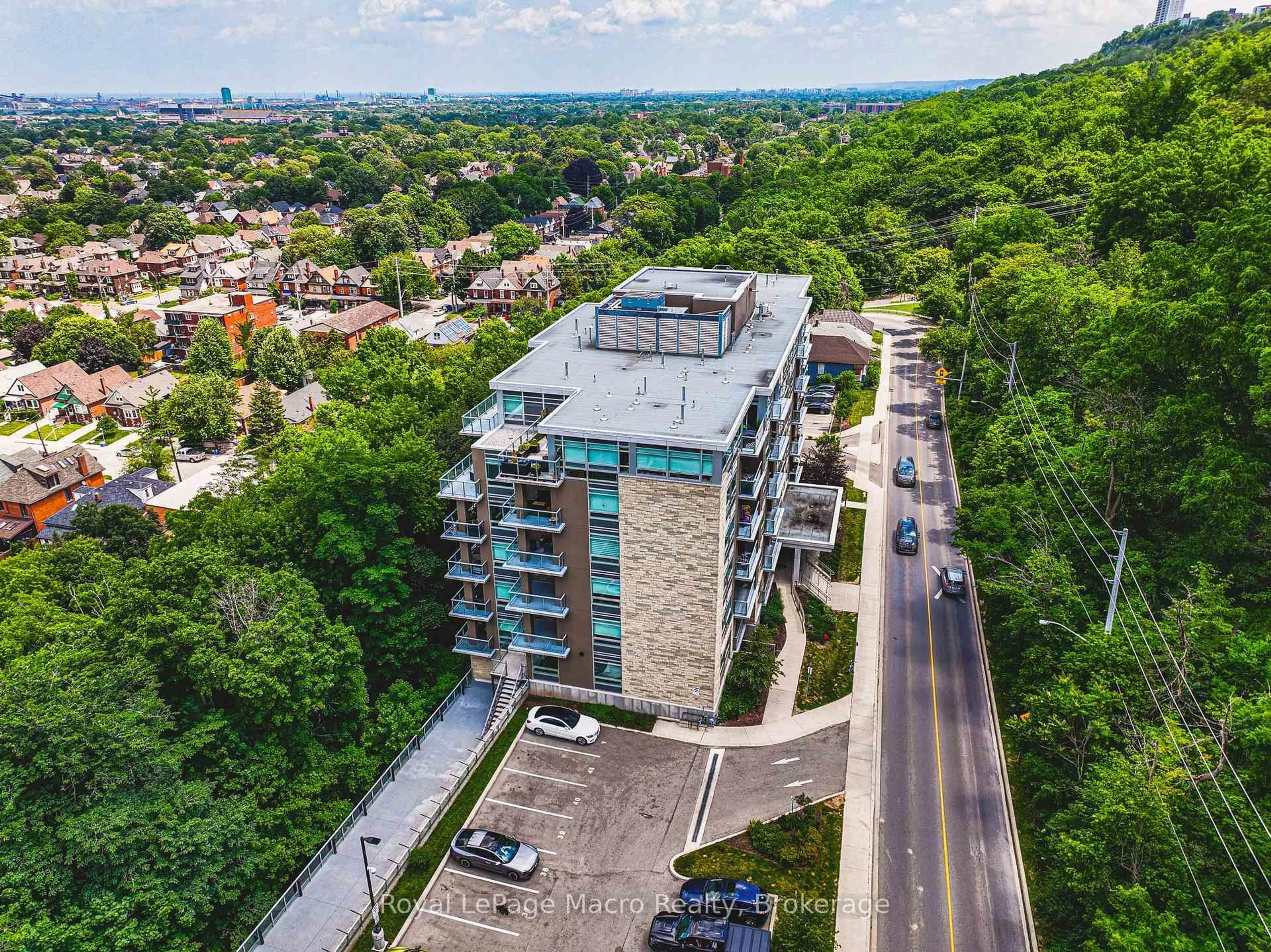 A pic from outside/outdoor area/front of a property/back of a property/a pic from drone, city buildings view from balcony for 479 Charlton Ave #105, Hamilton Ontario L8N 0B4