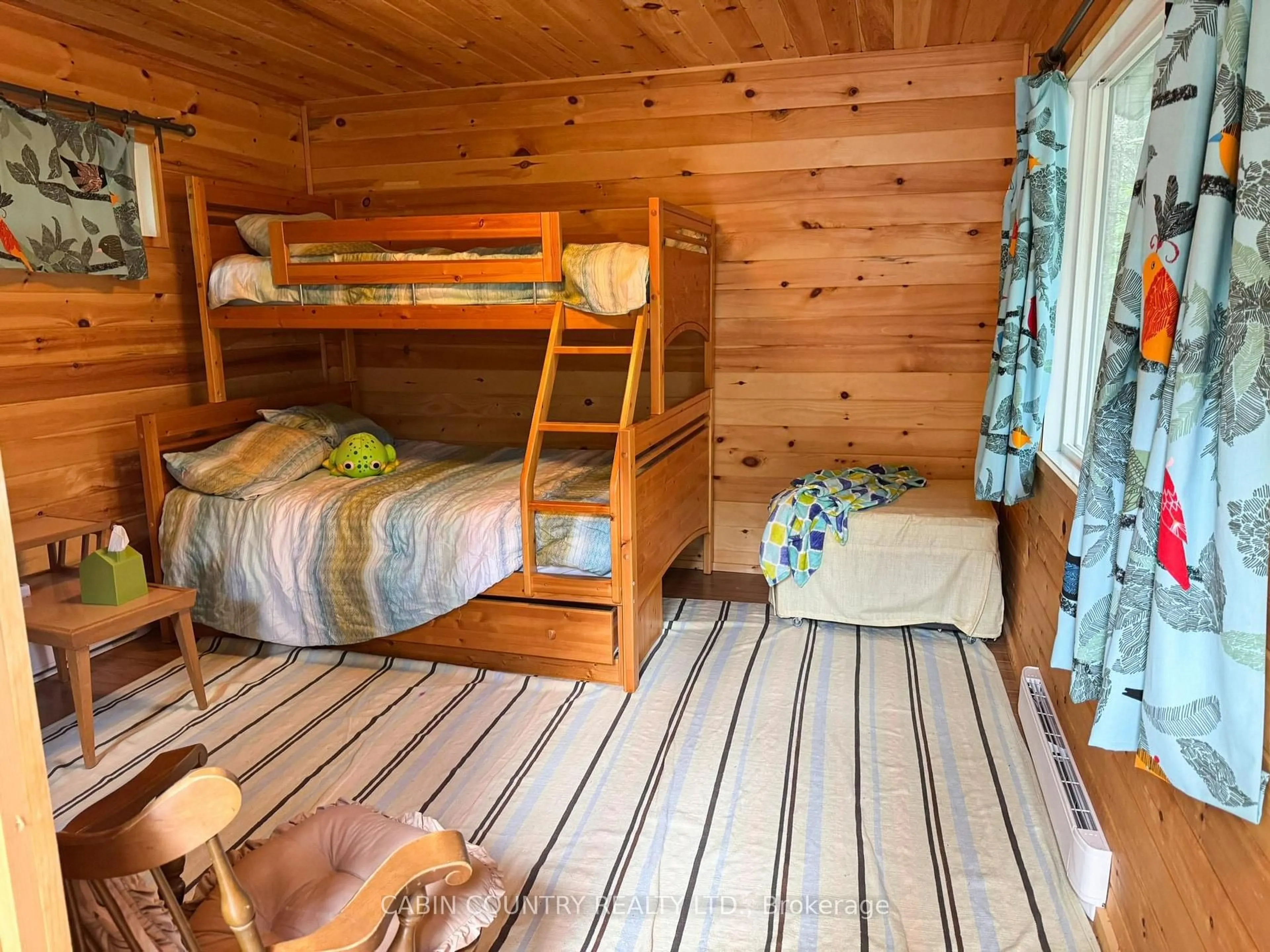 Bedroom with bed, wood/laminate floor for 1020 1021 Zig Zag Island, Kenora Remote Area Ontario P0X 1S0