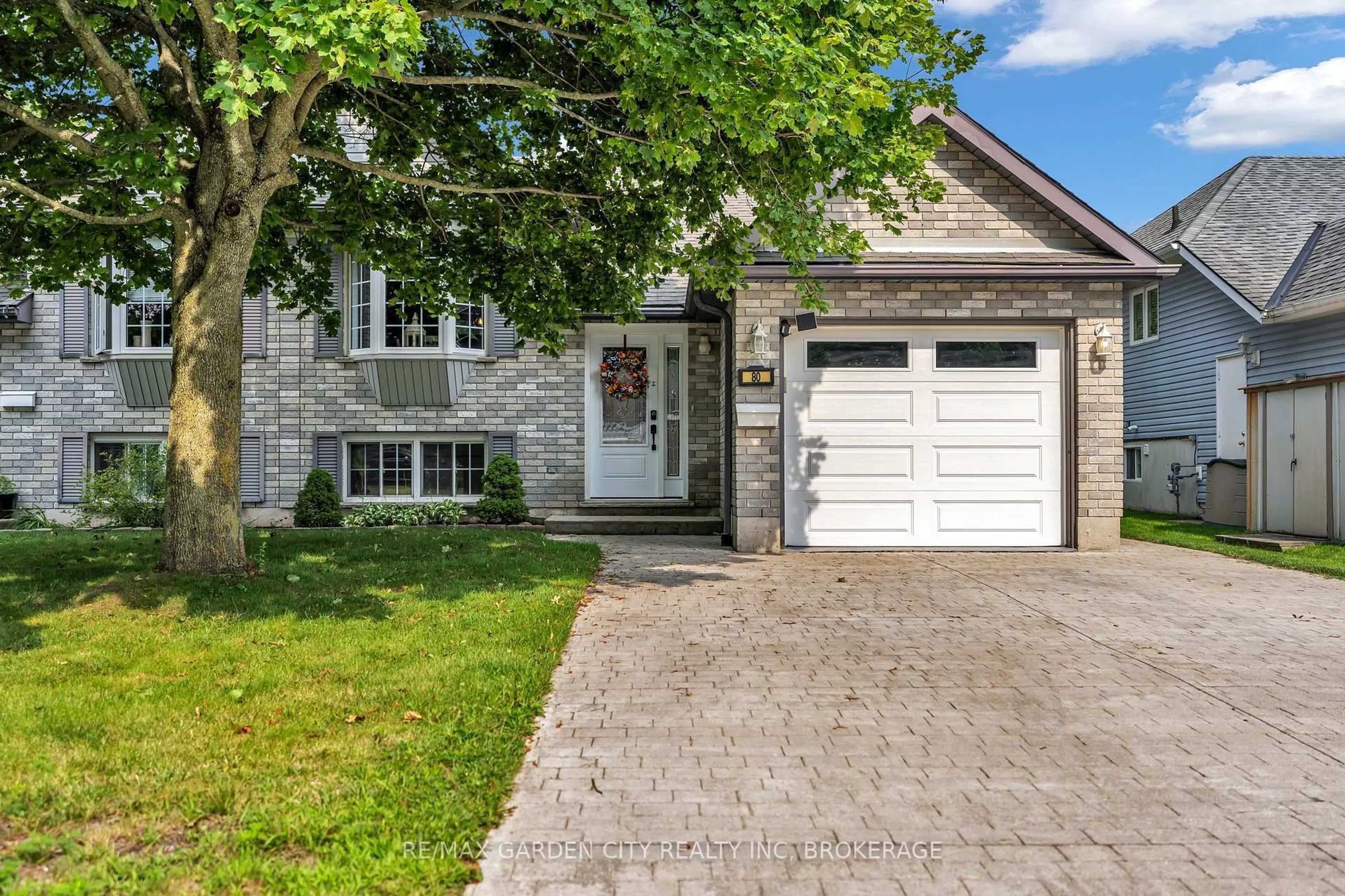 Home with brick exterior material, street for 80 Beckett Blvd, Tillsonburg Ontario N4G 5N3