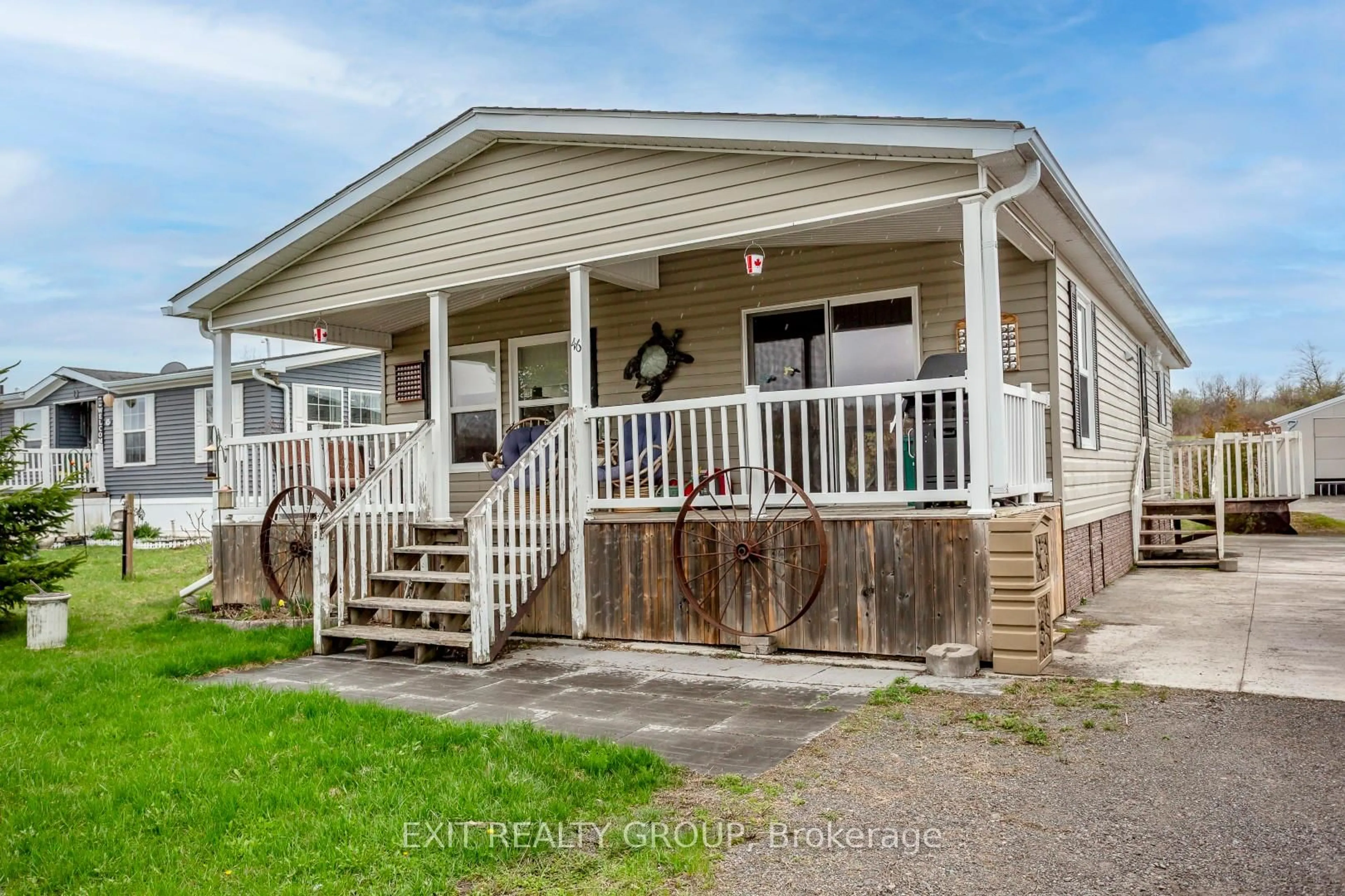 Home with vinyl exterior material, street for 46-152 Concession Road 11 W, Trent Hills Ontario K0L 1Y0