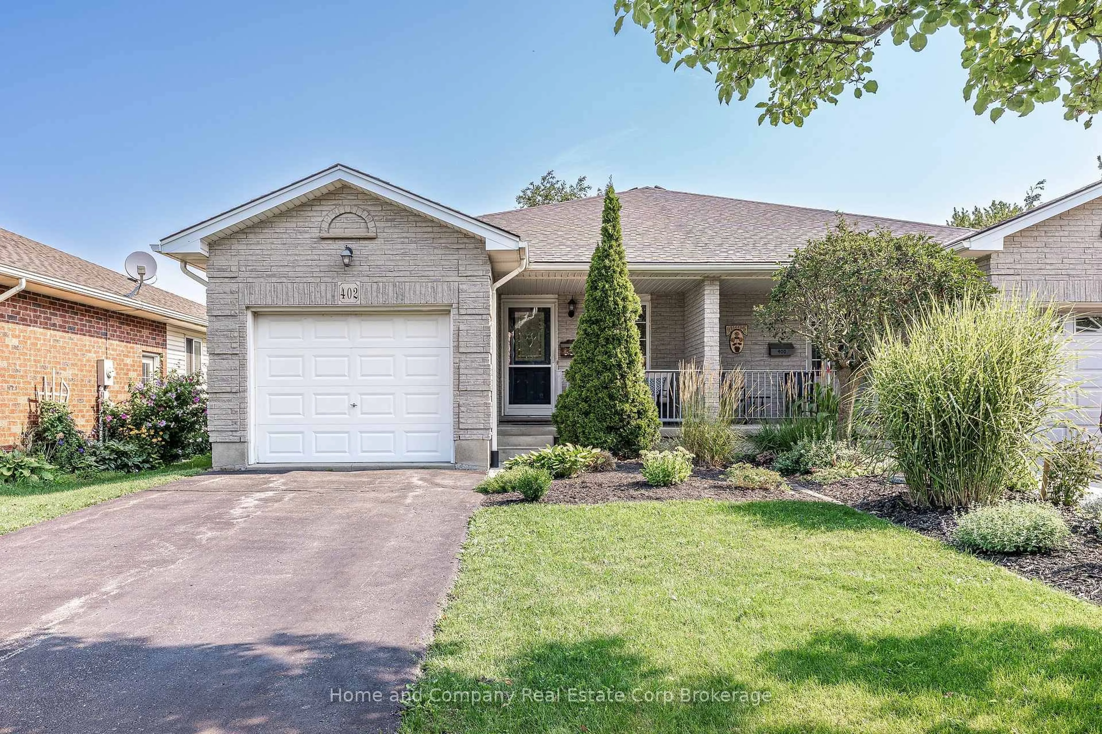 Home with brick exterior material, street for 402 Douglas St, Stratford Ontario N5A 7Z7