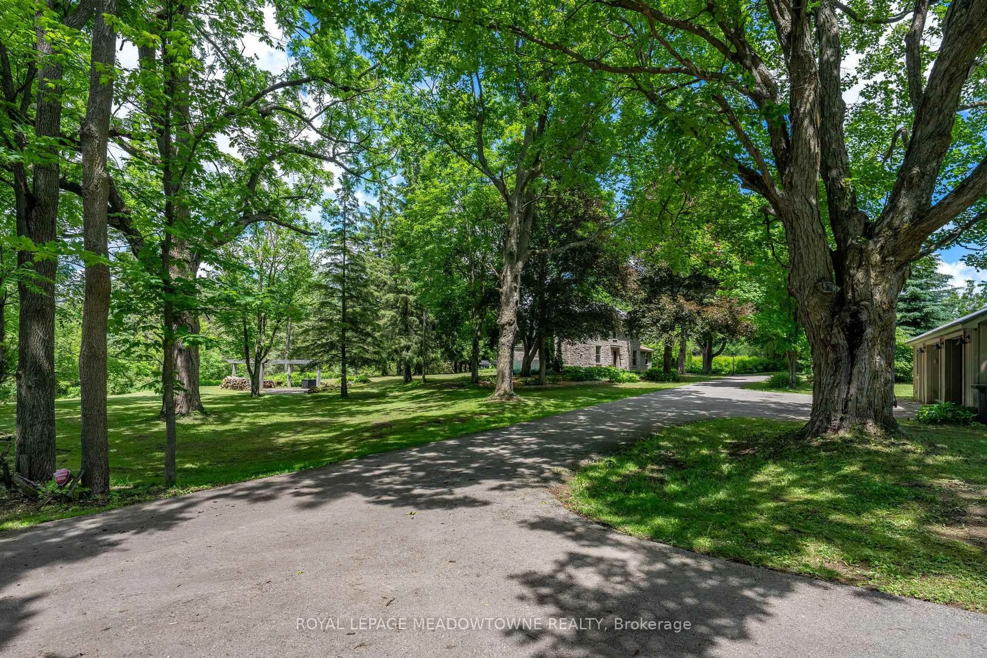 A pic from outside/outdoor area/front of a property/back of a property/a pic from drone, forest/trees view for 5405 Wellington Rd 52, Erin Ontario N0B 1T0