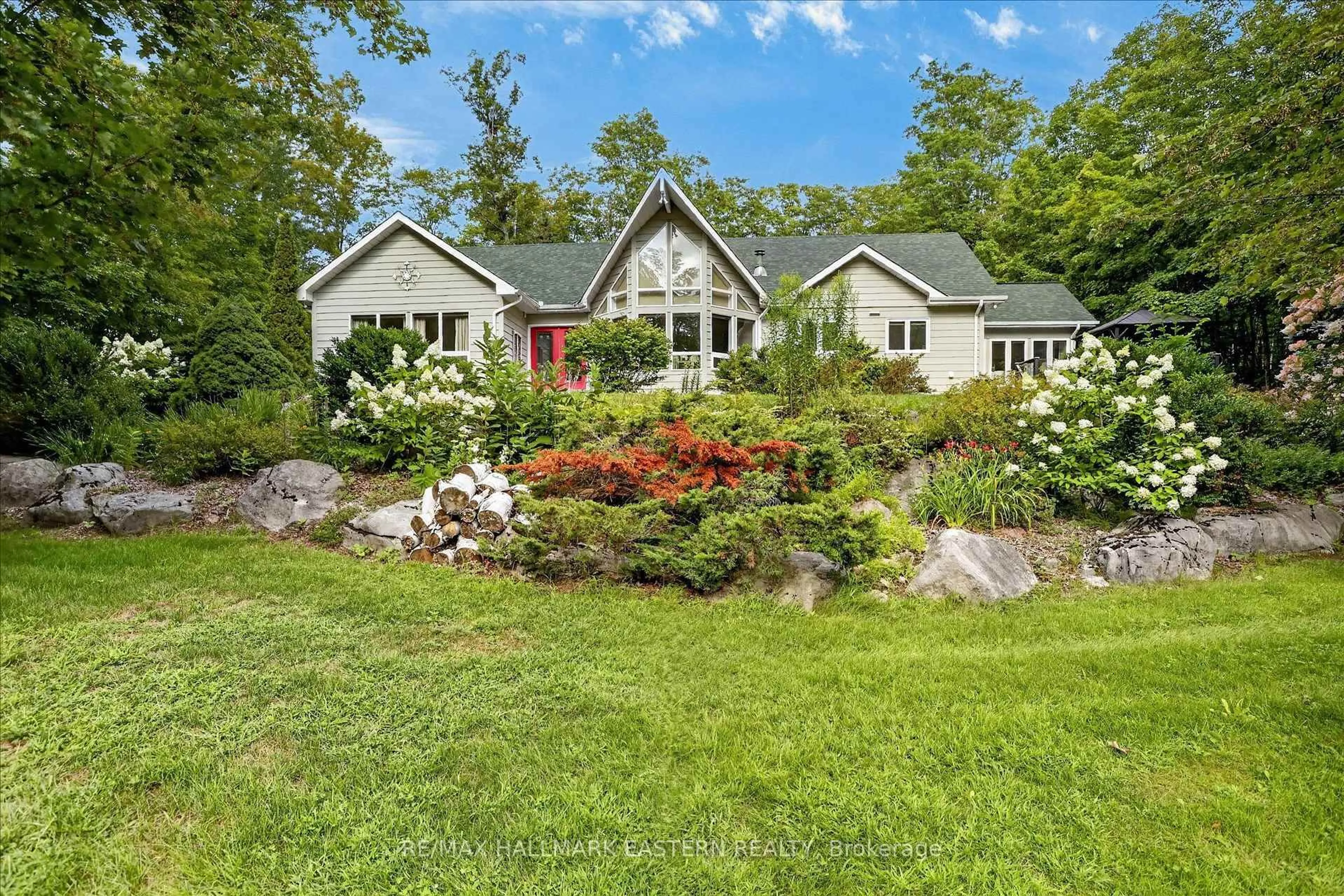 A pic from outside/outdoor area/front of a property/back of a property/a pic from drone, water/lake/river/ocean view for 1650 Sable Crt, Selwyn Ontario K0L 2H0