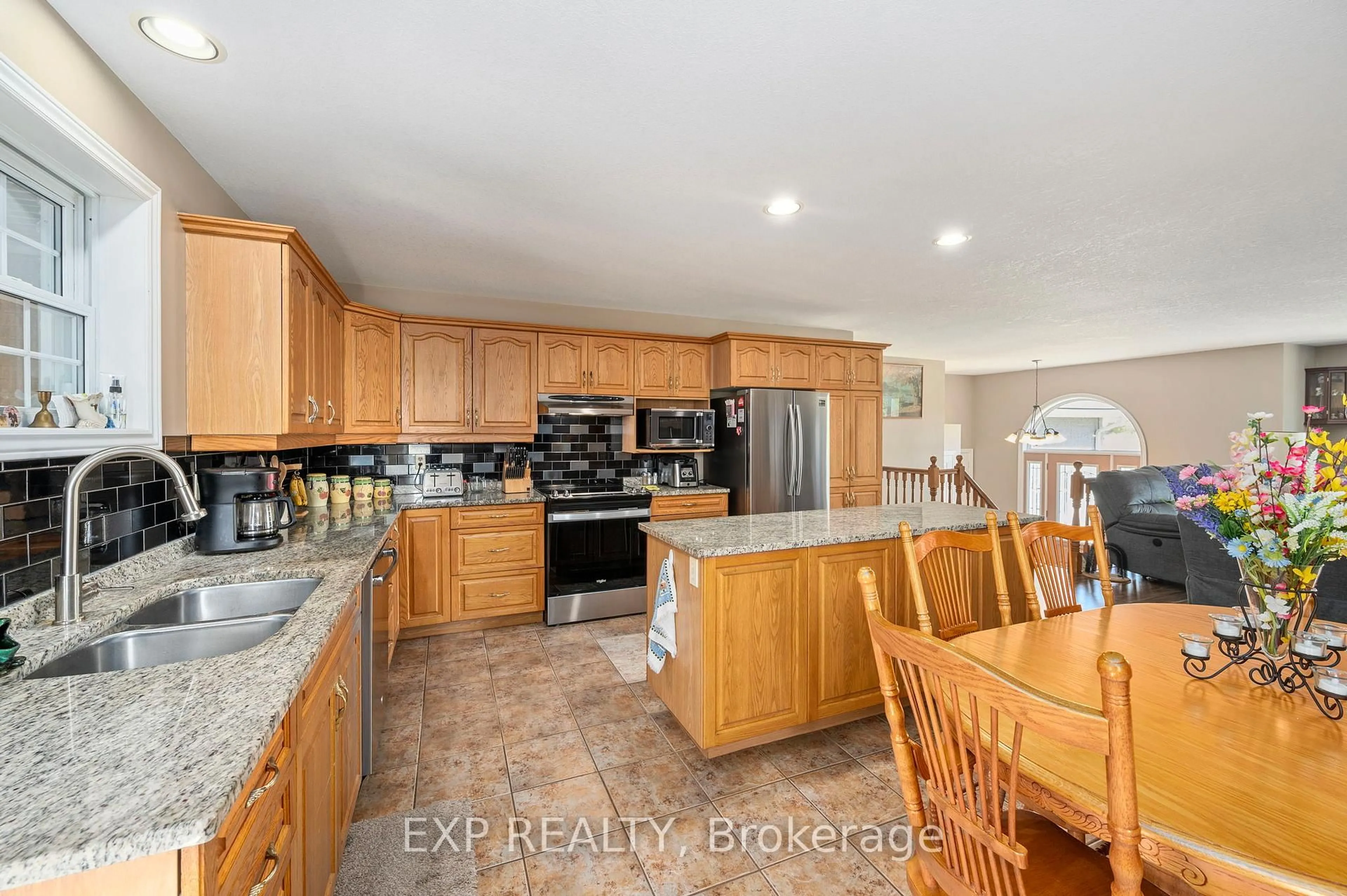 Open concept kitchen, ceramic/tile floor for 20437 Melbourne Rd, Southwest Middlesex Ontario N0L 1T0