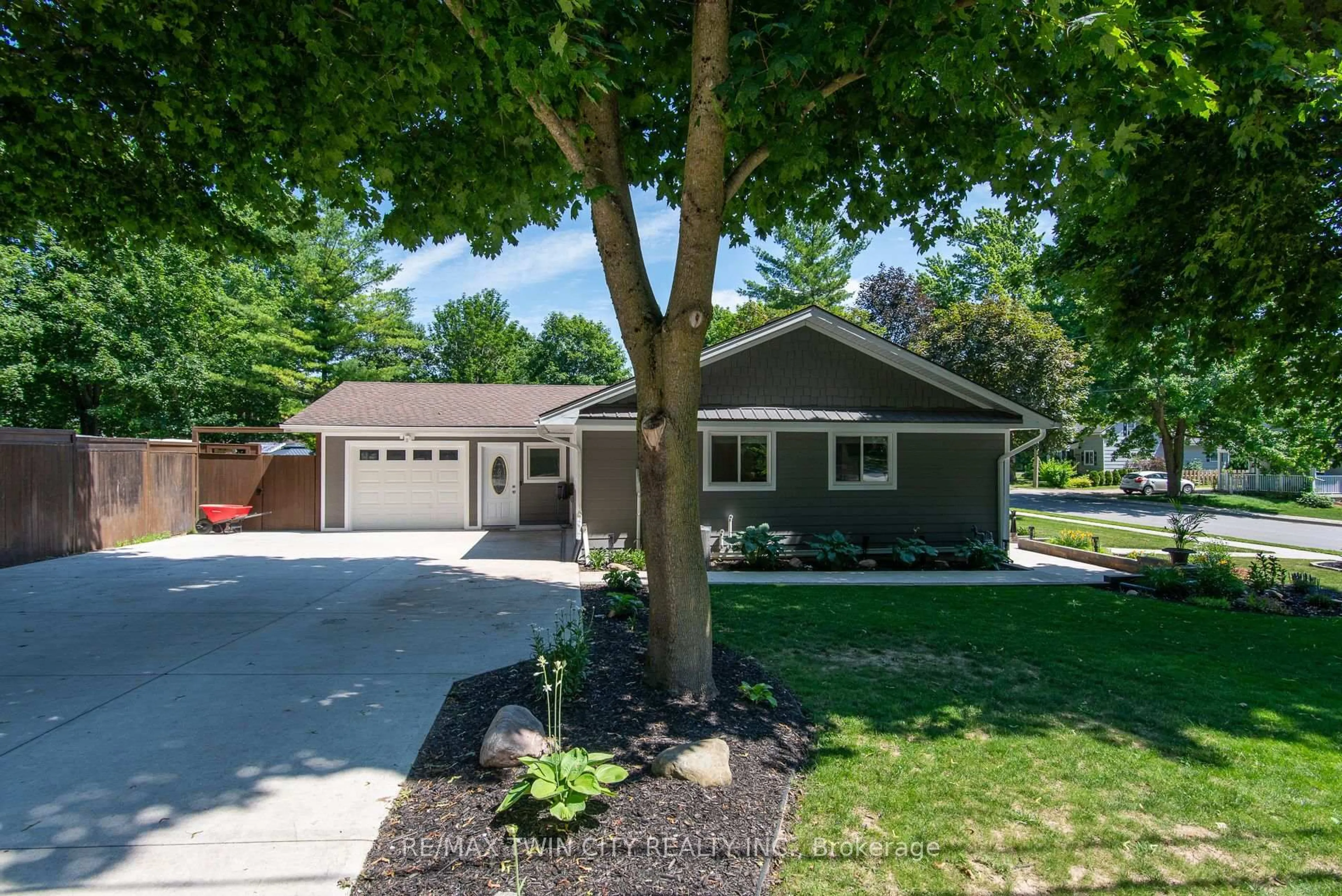 Home with vinyl exterior material, street for 99 John St, North Huron Ontario N0G 2W0