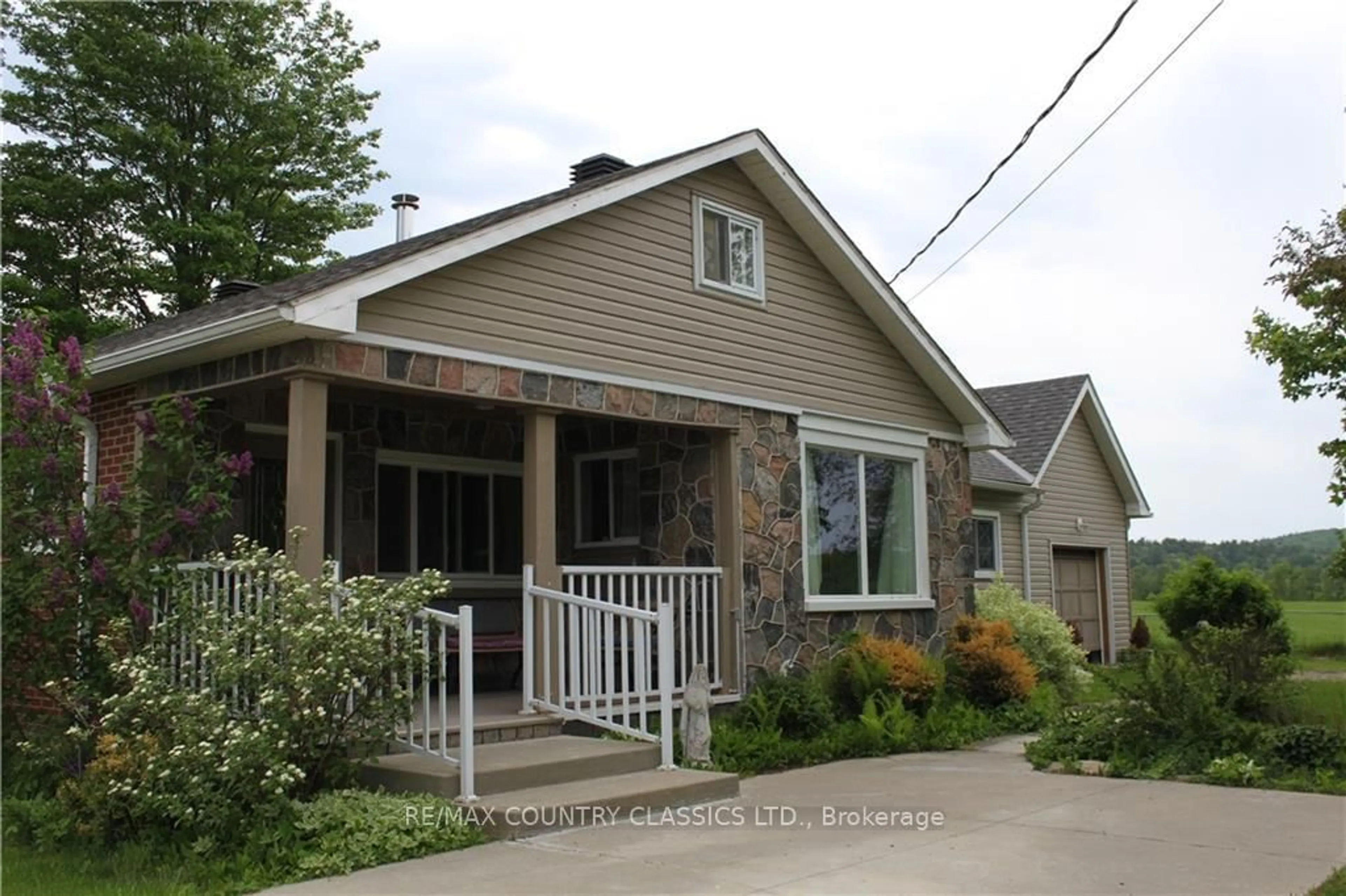 Home with vinyl exterior material, street for 70 MASK ISLAND Dr, Barry's Bay Ontario K0J 1B0