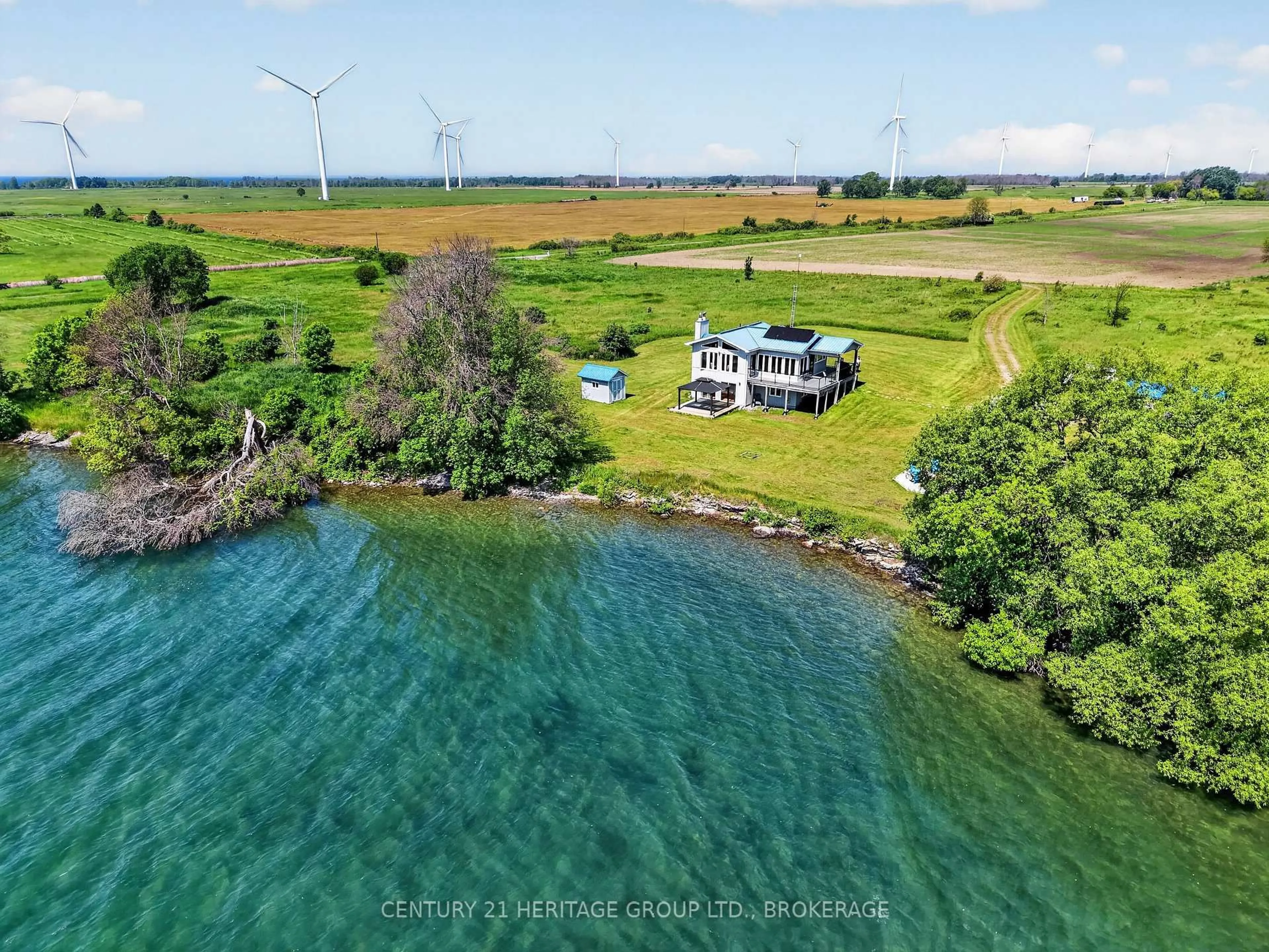 A pic from outside/outdoor area/front of a property/back of a property/a pic from drone, water/lake/river/ocean view for 648 Third Line Rd, Wolfe Island Ontario K0H 2Y0