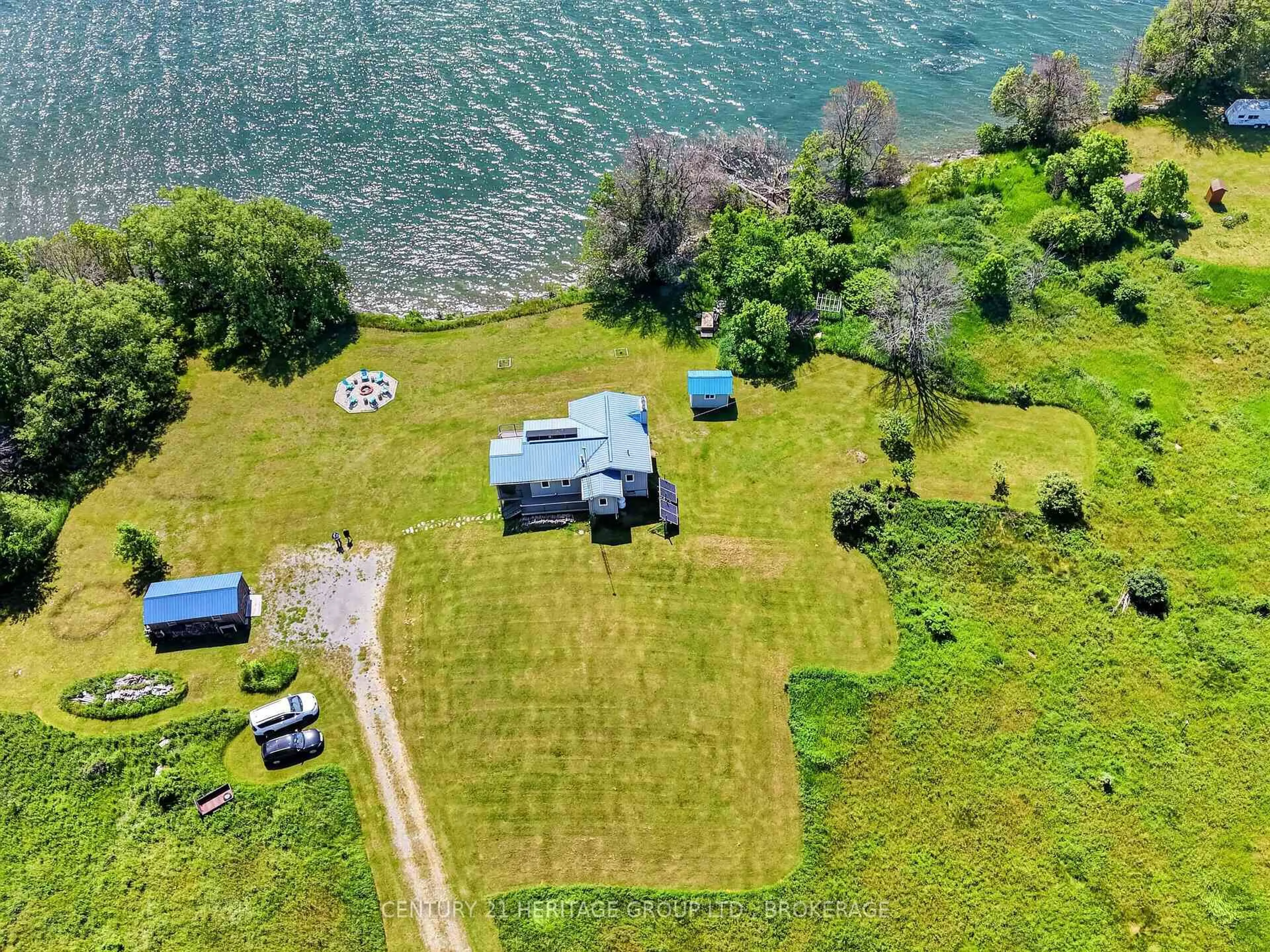 A pic from outside/outdoor area/front of a property/back of a property/a pic from drone, water/lake/river/ocean view for 648 Third Line Rd, Wolfe Island Ontario K0H 2Y0