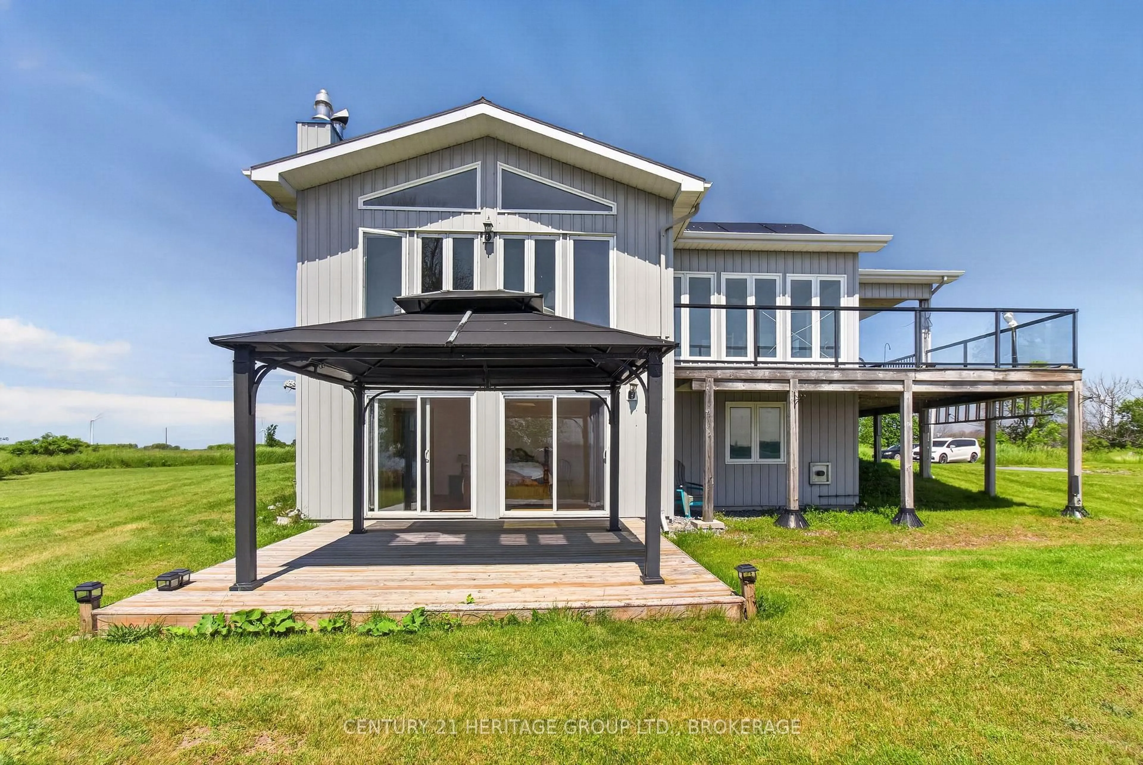 Home with vinyl exterior material, water/lake/river/ocean view for 648 Third Line Rd, Wolfe Island Ontario K0H 2Y0