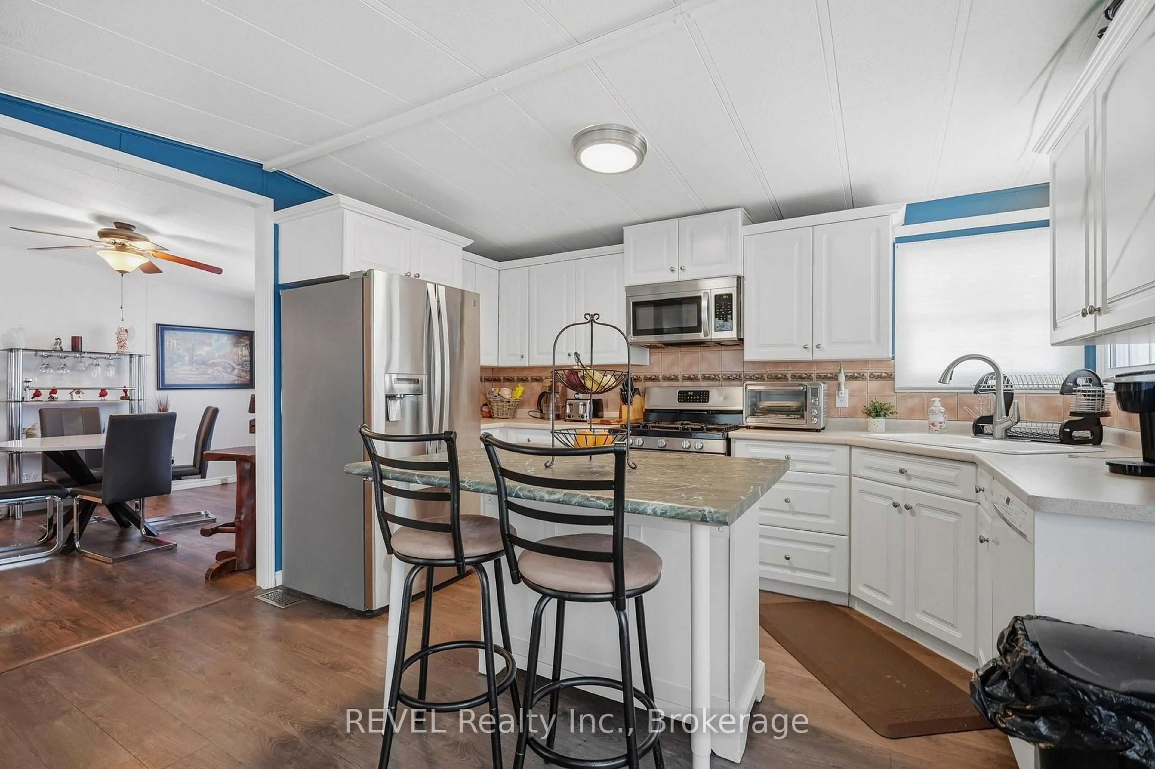 Open concept kitchen, ceramic/tile floor for 3033 Townline Rd #128, Fort Erie Ontario L0S 1S1