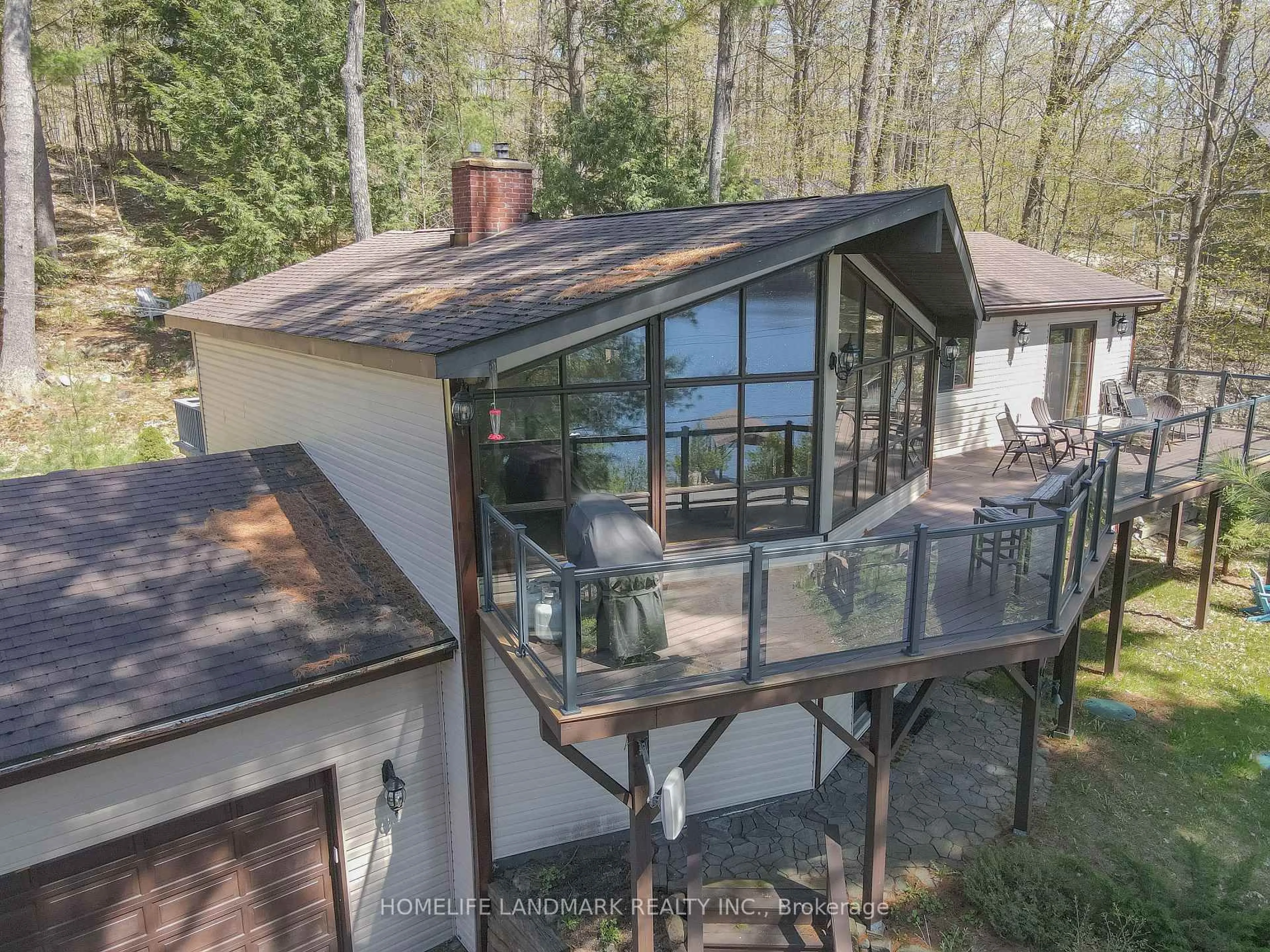 A pic from outside/outdoor area/front of a property/back of a property/a pic from drone, unknown for 1245 Mortimers Point Rd, Muskoka Lakes Ontario P0B 1J0