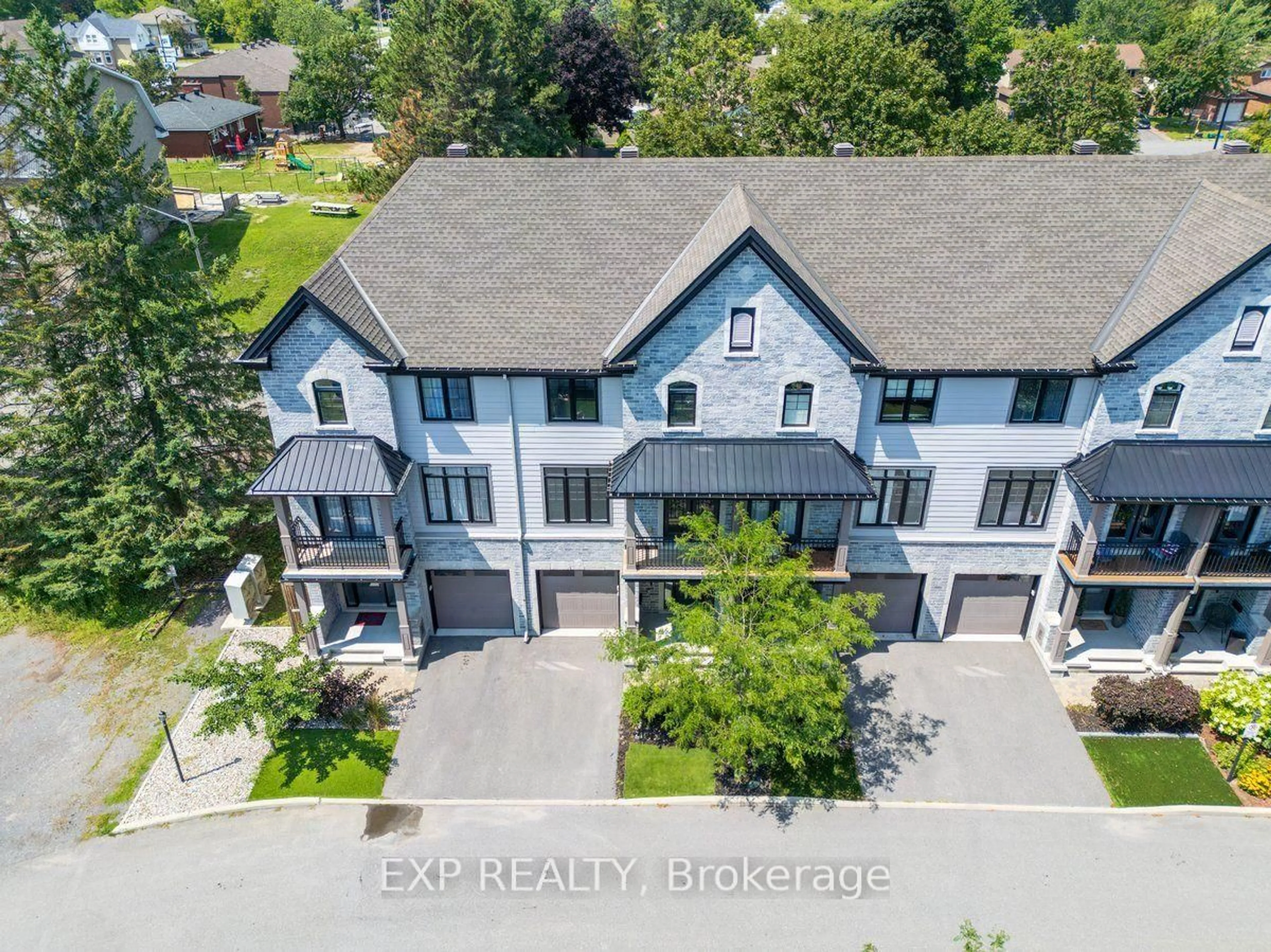 A pic from outside/outdoor area/front of a property/back of a property/a pic from drone, unknown for 703 Reverie Private, Stittsville Ontario K2S 1E3