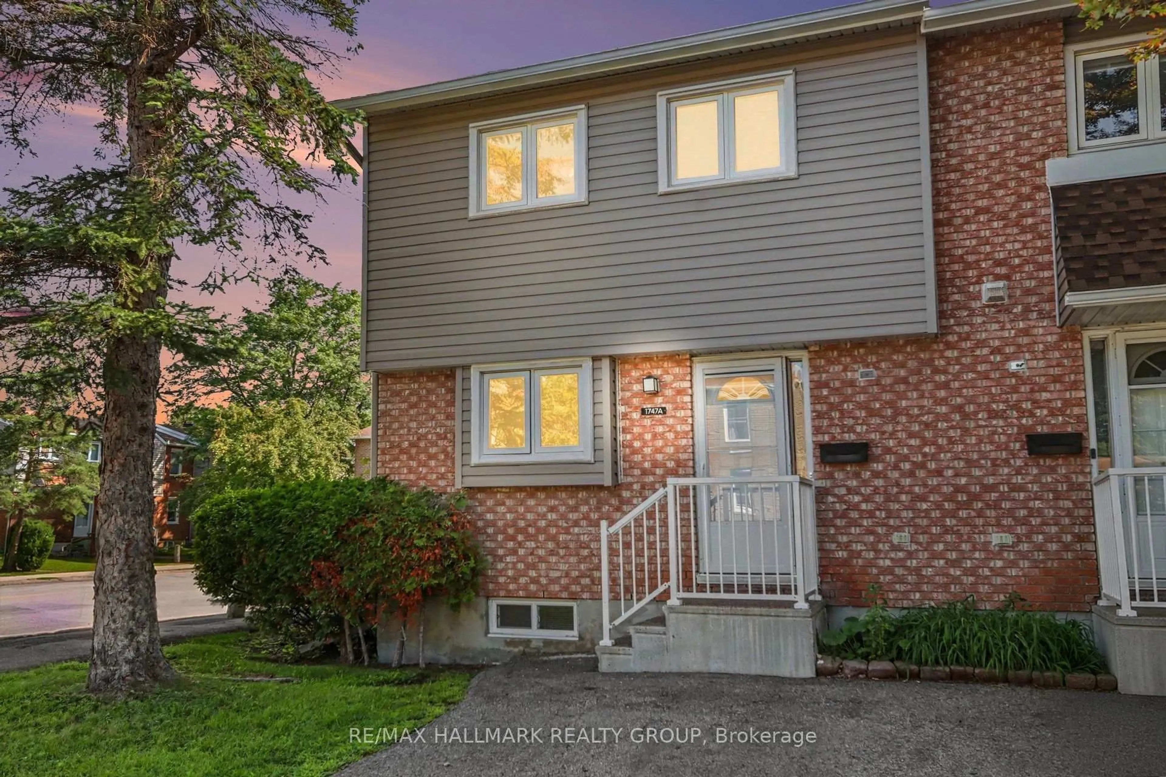 Home with brick exterior material, street for 1747A Lamoureux Dr, Ottawa Ontario K1E 2N3