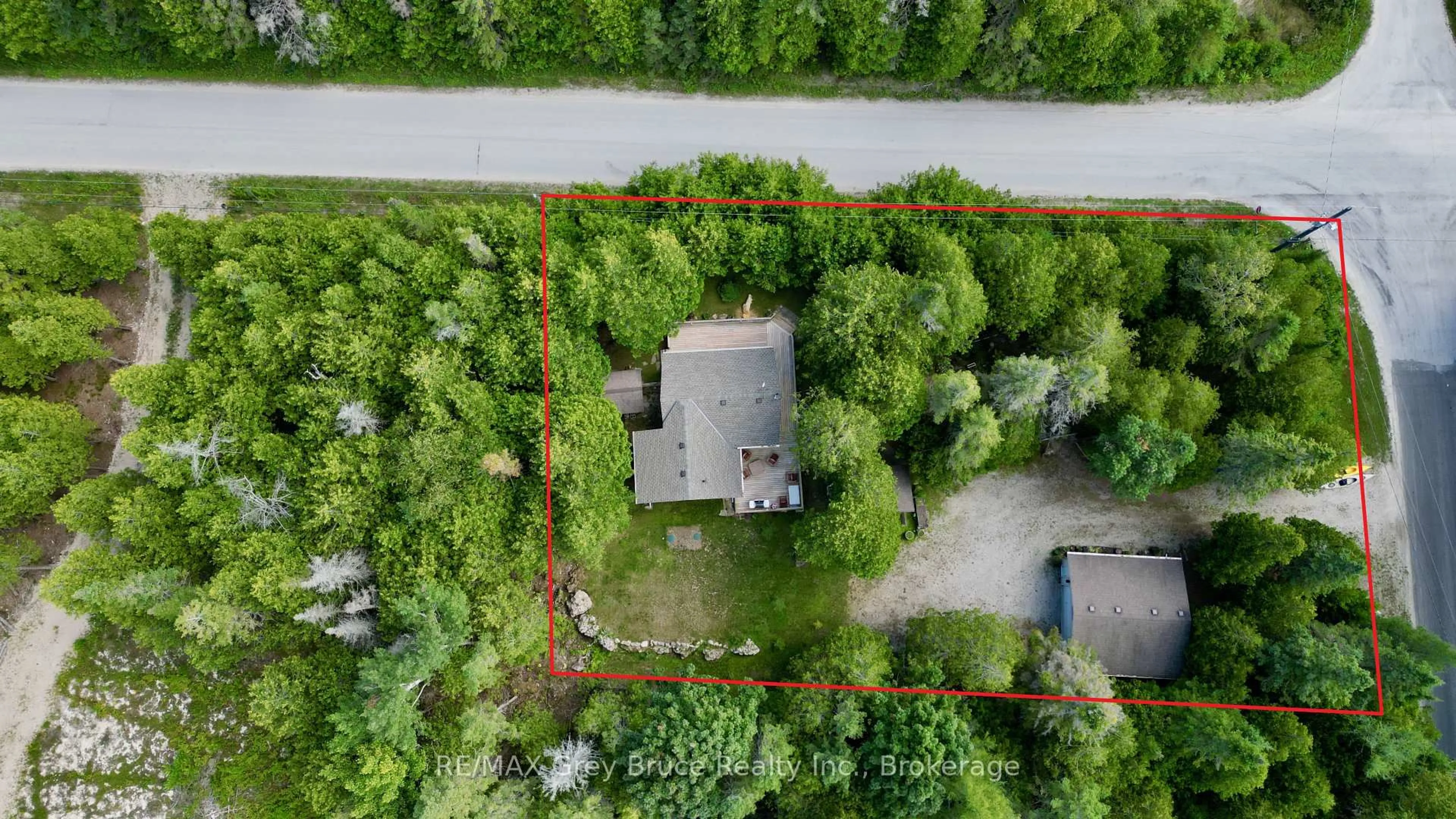 A pic from outside/outdoor area/front of a property/back of a property/a pic from drone, forest/trees view for 202 Whiskey Harbour Rd, Northern Bruce Peninsula Ontario N0H 1W0