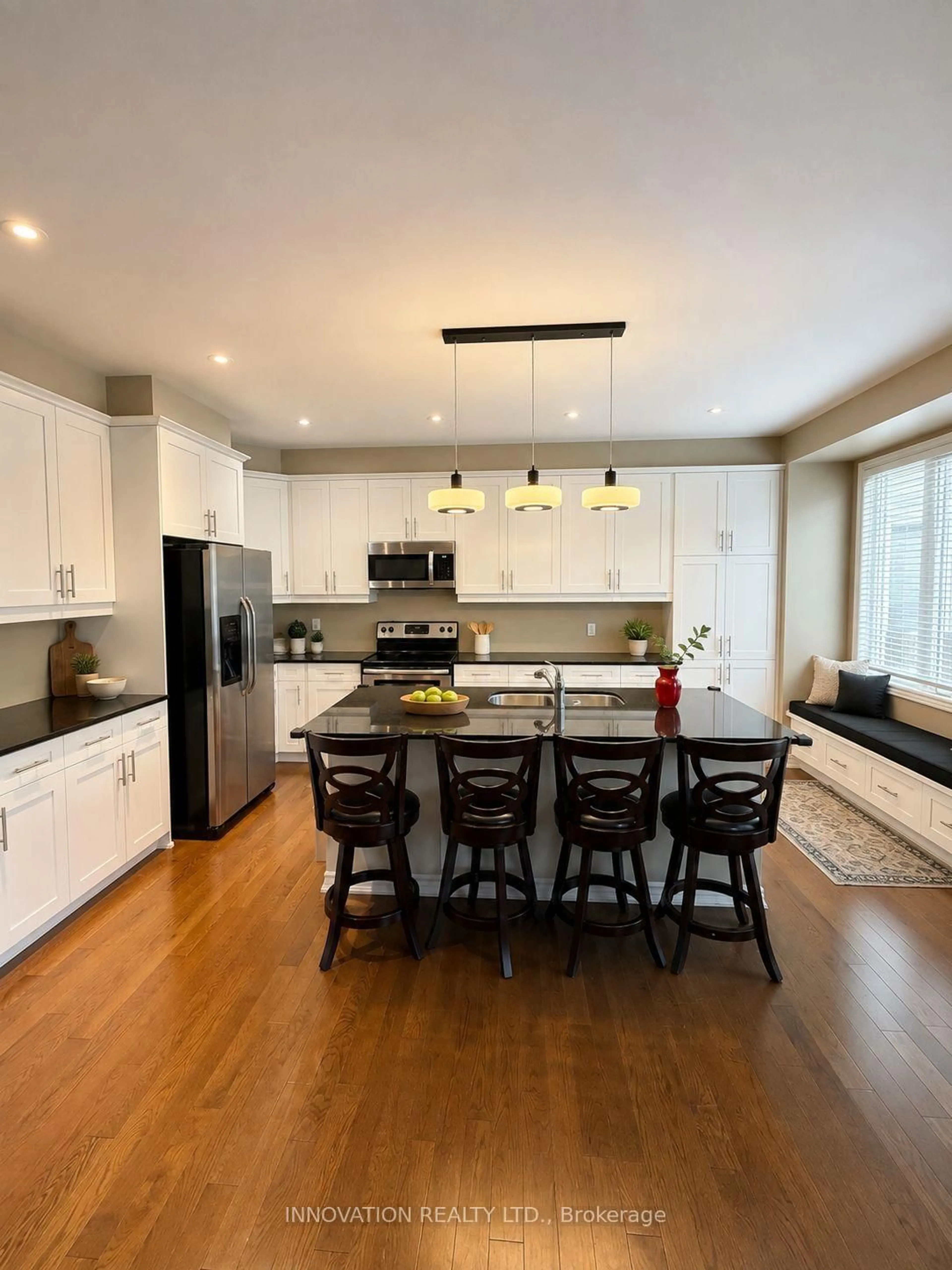Open concept kitchen, wood/laminate floor for 1782 Maple Grove Rd, Ottawa Ontario K2S 0P4