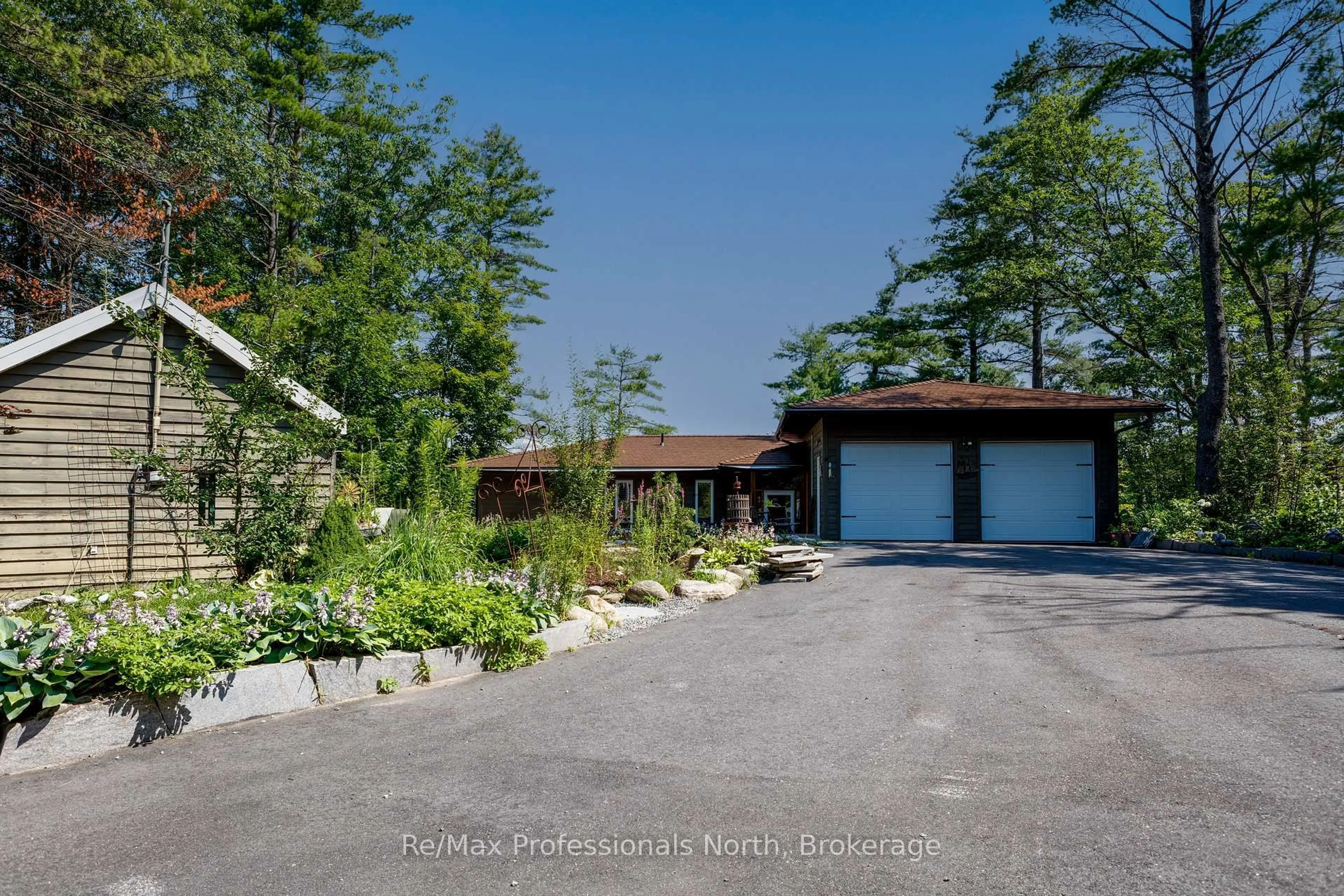 A pic from outside/outdoor area/front of a property/back of a property/a pic from drone, street for 2164 169 Muskoka Rd, Gravenhurst Ontario P1P 1R2