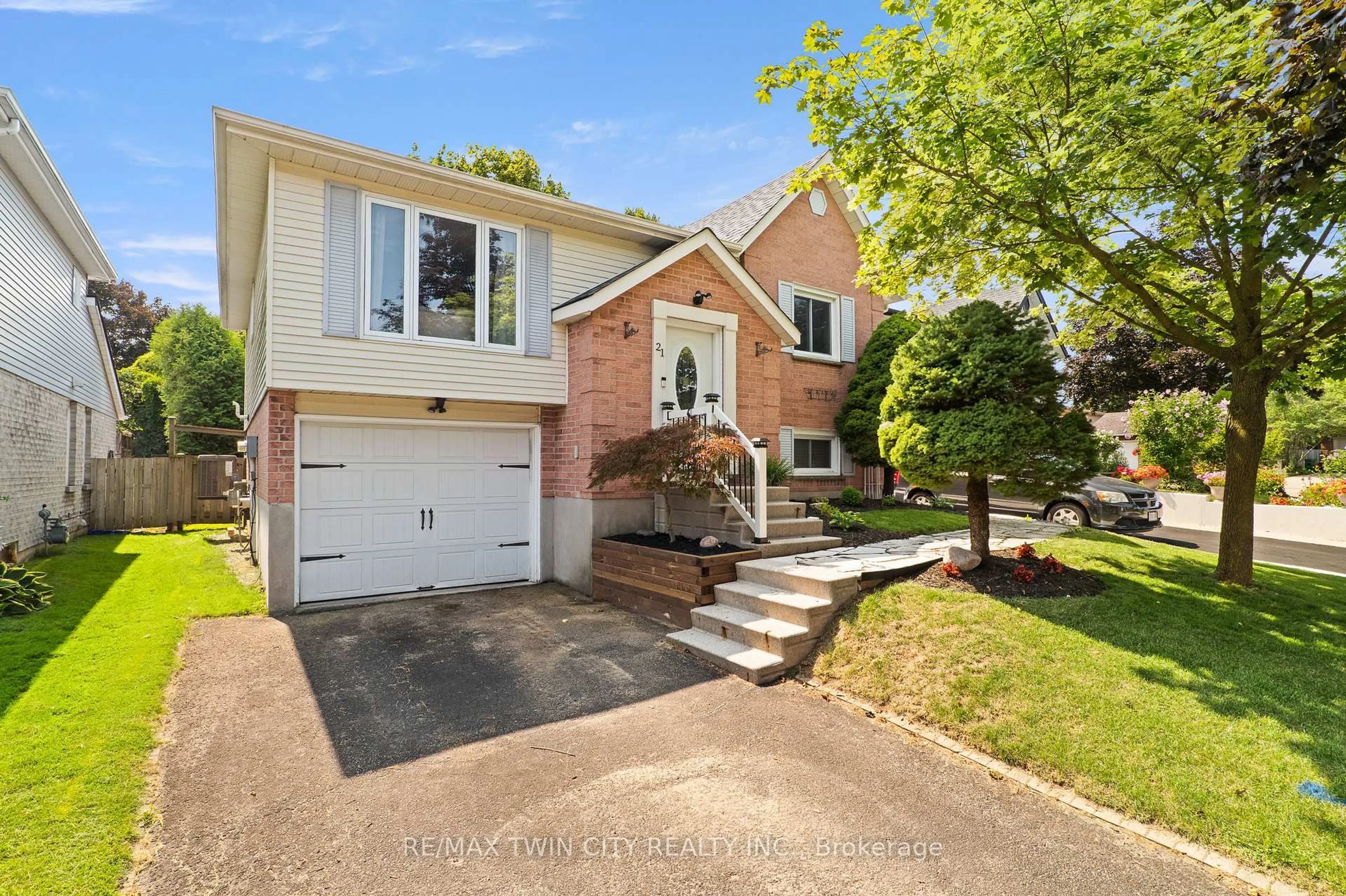 Home with brick exterior material, street for 21 Golden Meadow Cres, Kitchener Ontario N2N 2L7