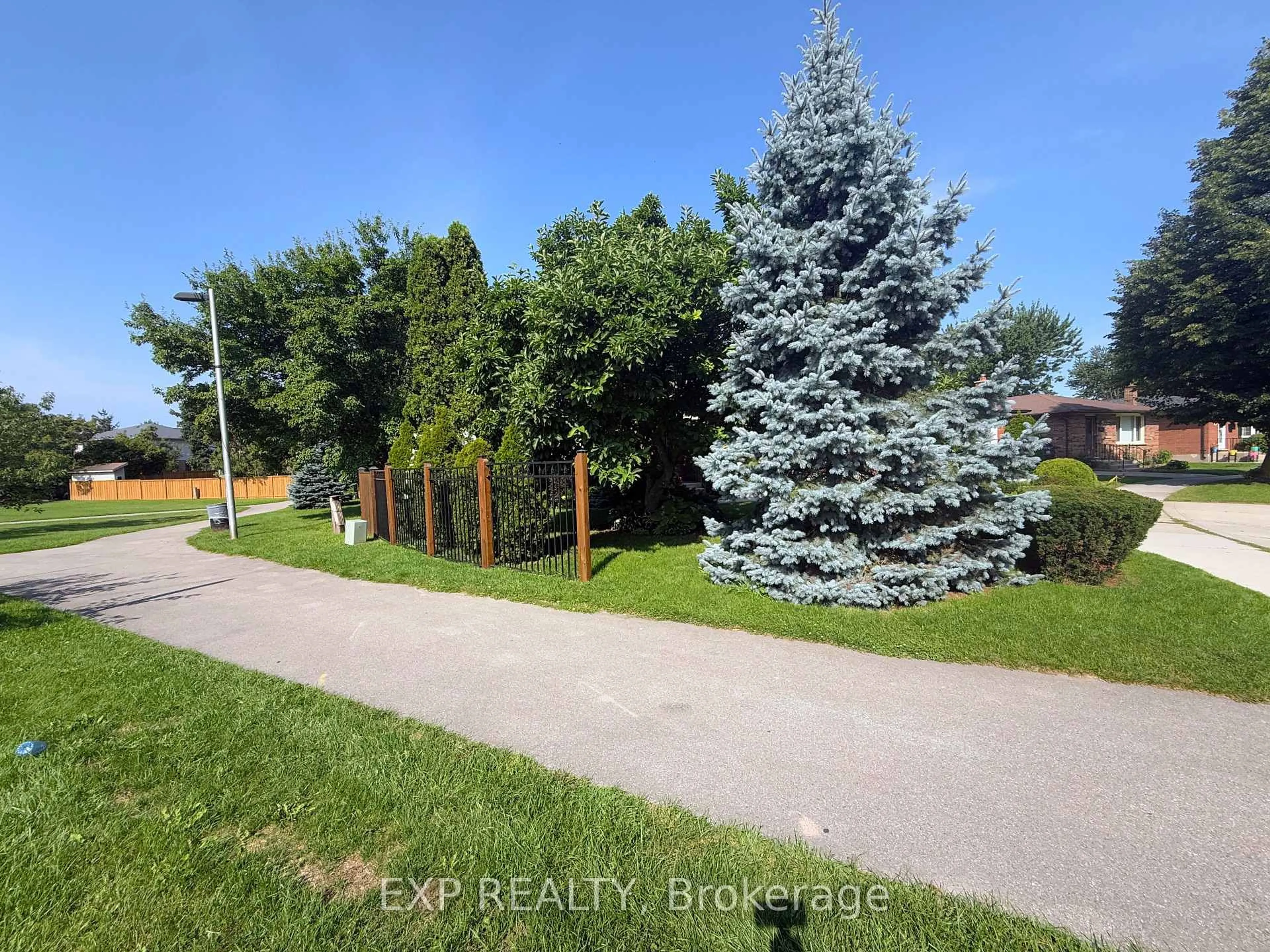 A pic from outside/outdoor area/front of a property/back of a property/a pic from drone, forest/trees view for 82 Lacey Cres, London South Ontario N6E 2E7