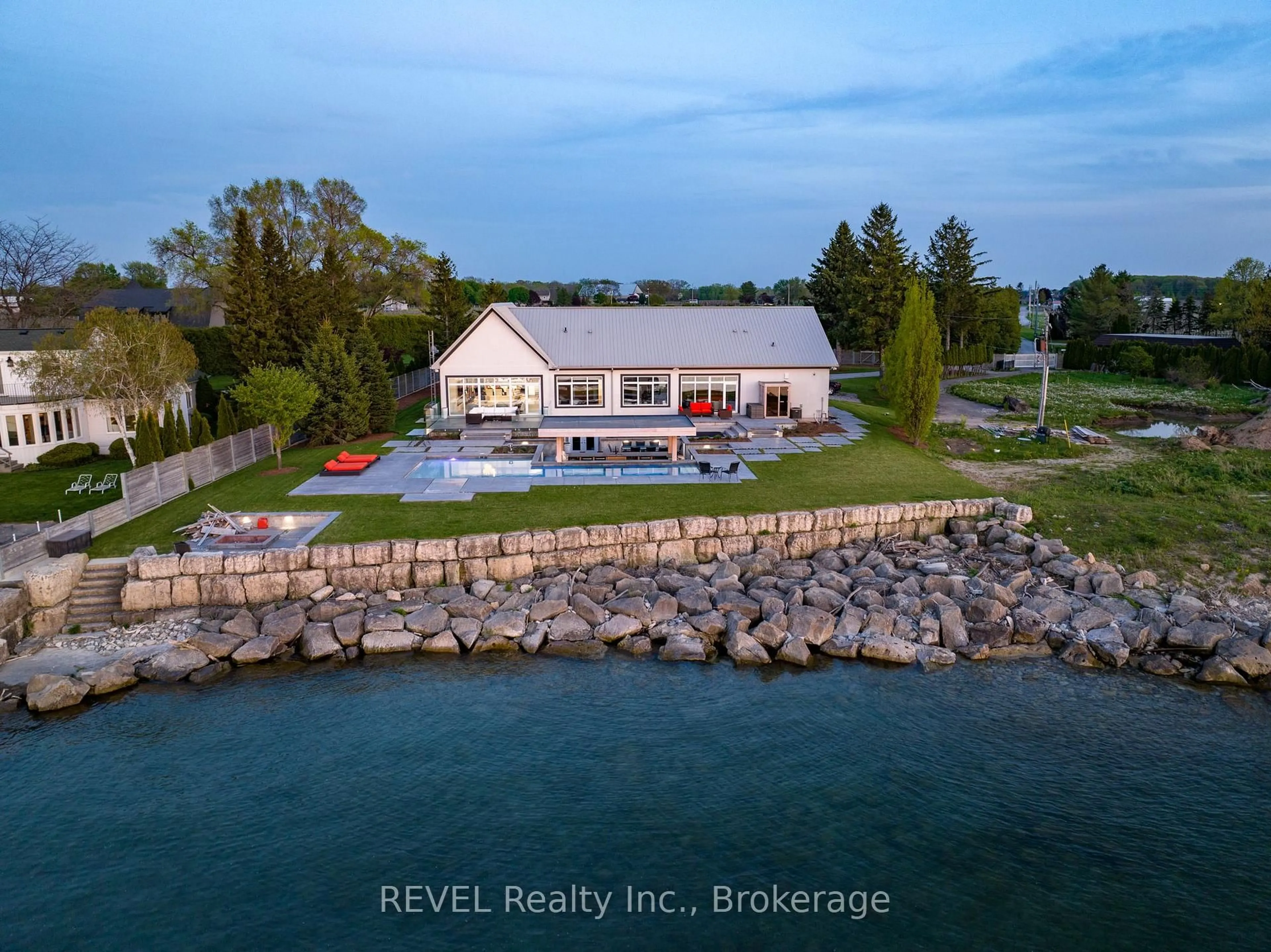 A pic from outside/outdoor area/front of a property/back of a property/a pic from drone, water/lake/river/ocean view for 4 FIRELANE 4B, Niagara-on-the-Lake Ontario L0S 1J0