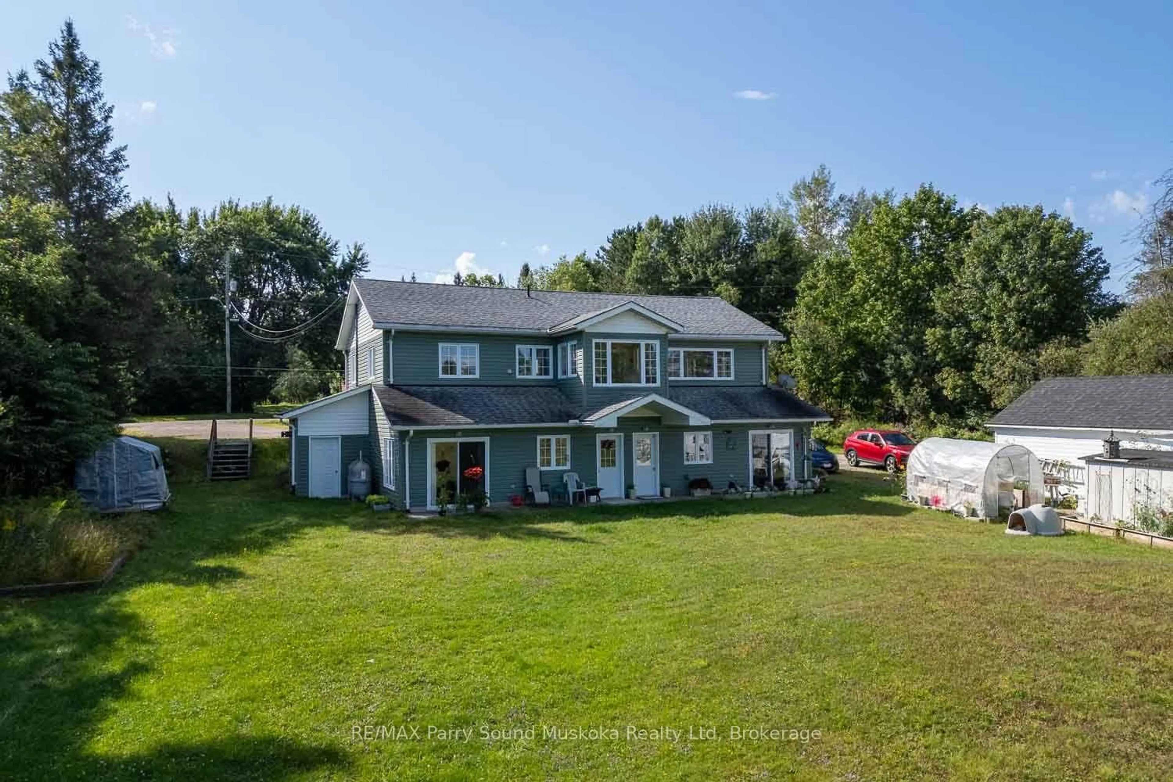 A pic from outside/outdoor area/front of a property/back of a property/a pic from drone, water/lake/river/ocean view for 187 Victoria St, Magnetawan Ontario P0A 1P0