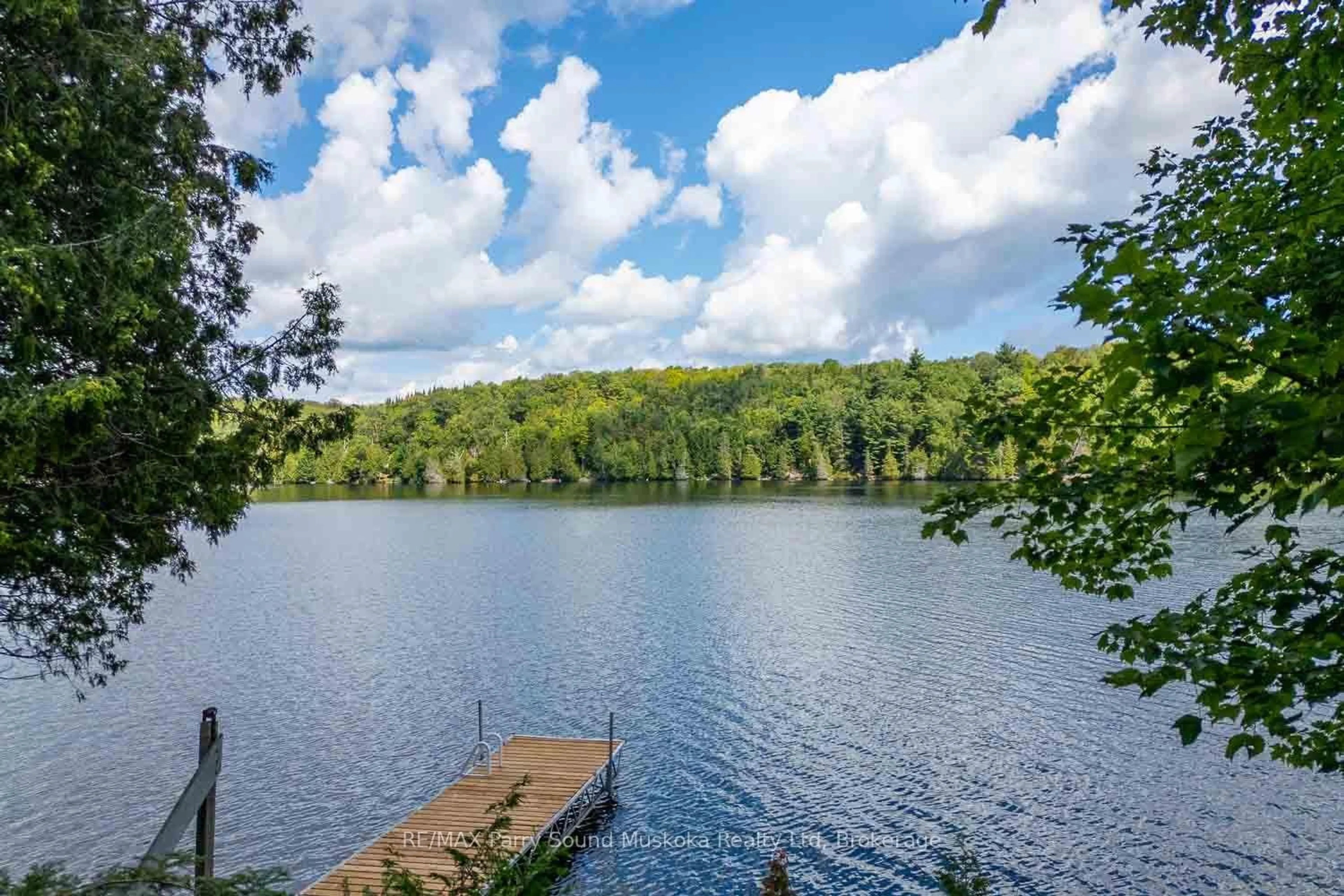 A pic from outside/outdoor area/front of a property/back of a property/a pic from drone, water/lake/river/ocean view for 1889 South Horn Lake Rd, Magnetawan Ontario P0A 1P0