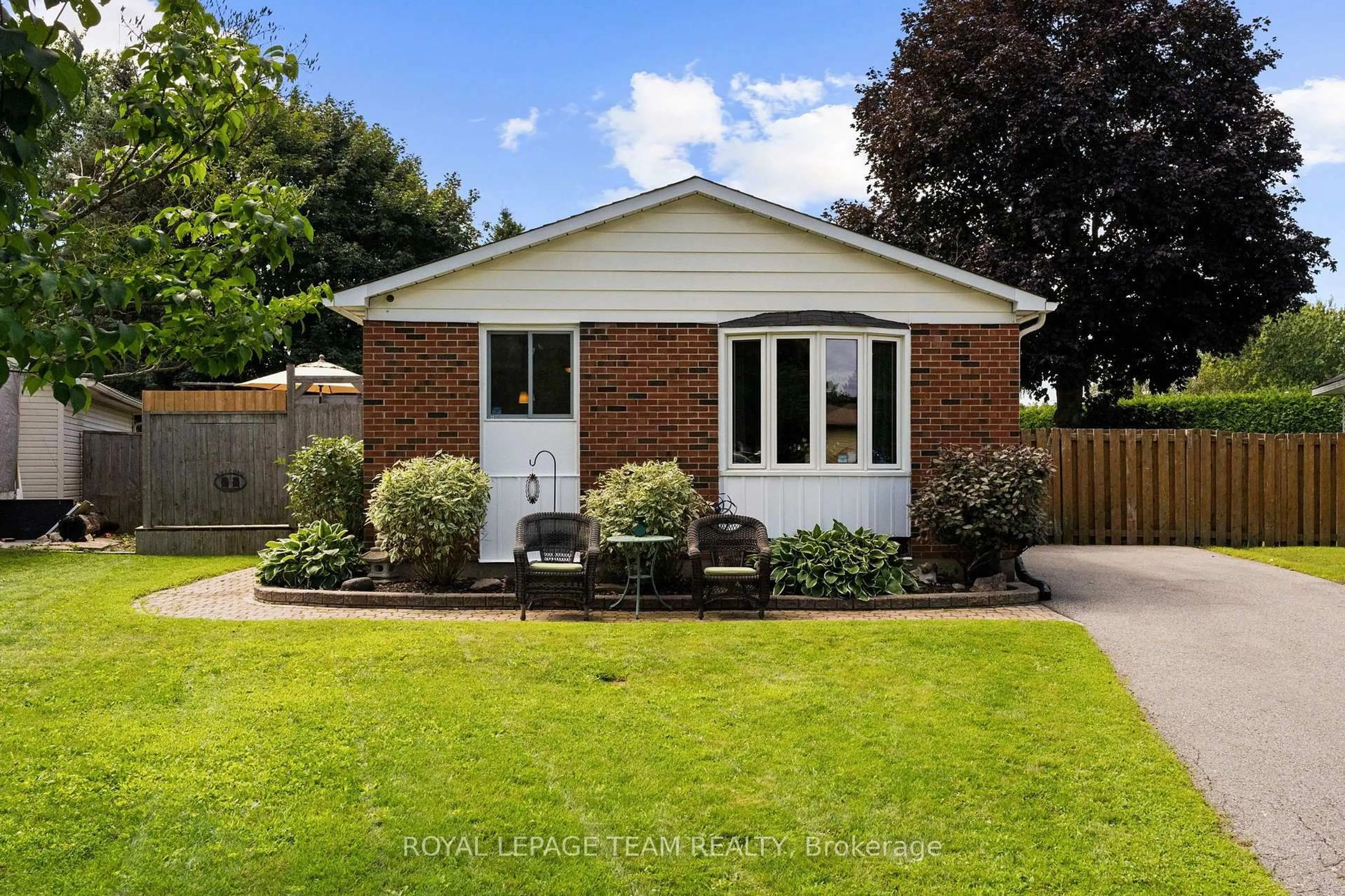 Home with brick exterior material, street for 27 Ballantrae Way, Ottawa Ontario K2L 1N3